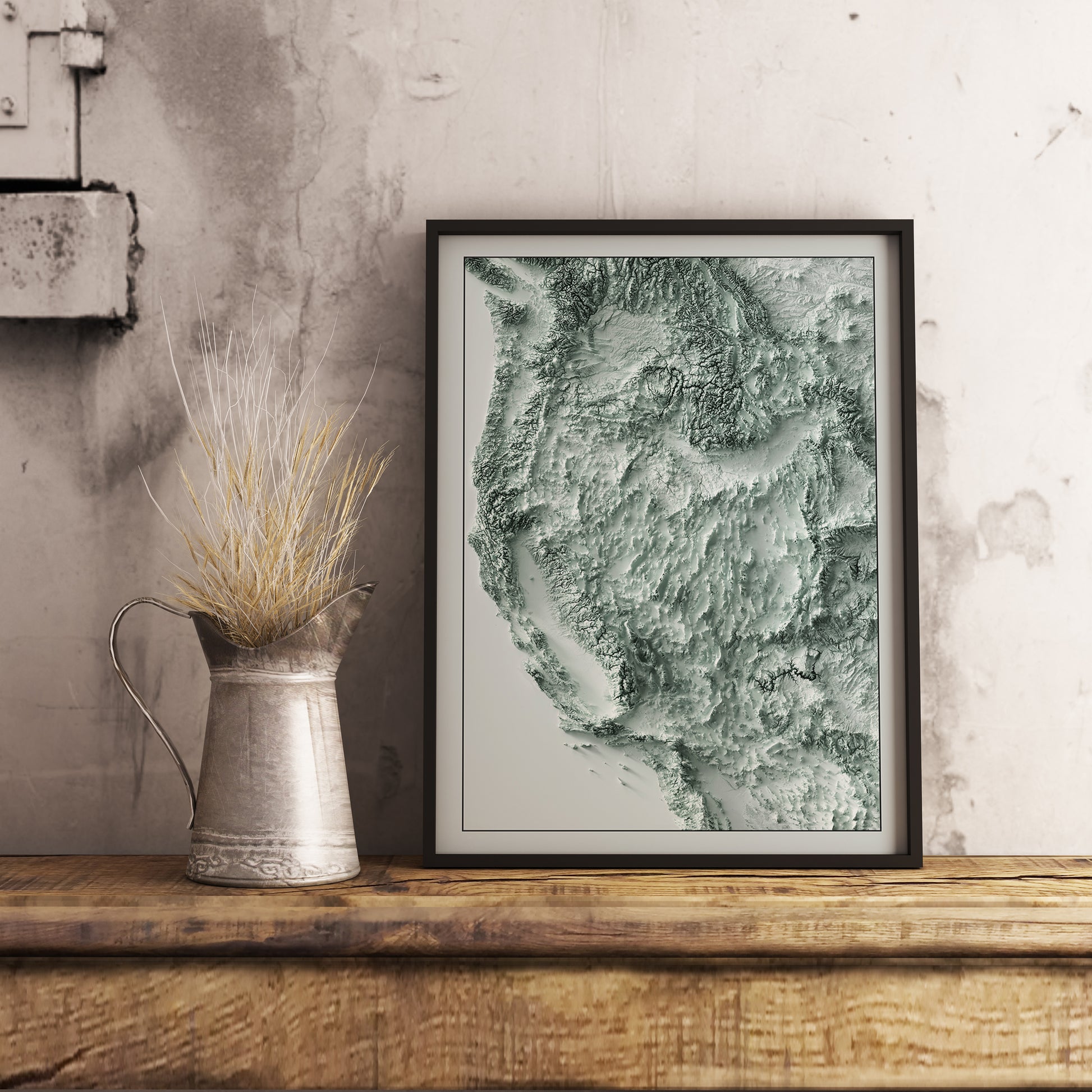 Western United States (USA) shaded relief map in black frame. Realistic terrain art print for home decor, displayed on rustic wooden table