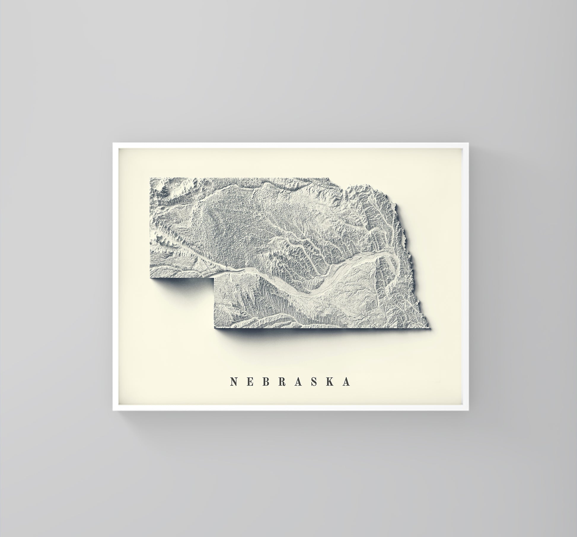 Nebraska (USA) vintage framed shaded relief map in white frame. Artistic print highlighting mountains with a realistic 3d effect