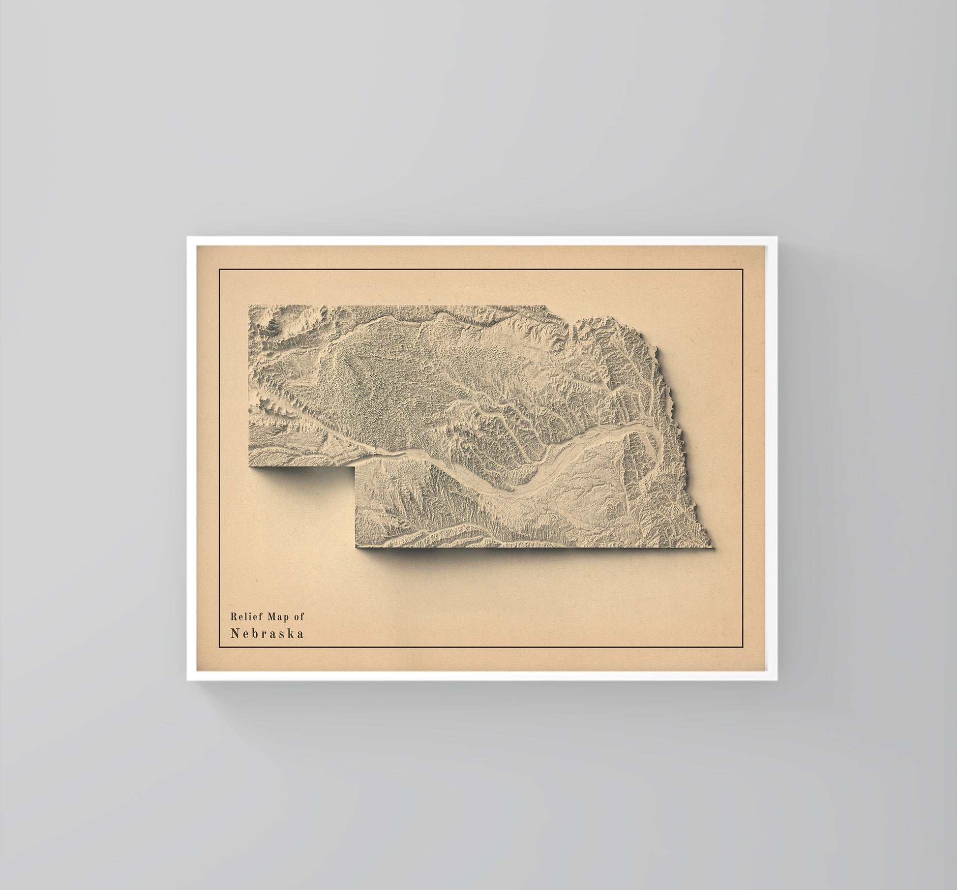 Nebraska (USA) vintage framed shaded relief map in white frame. Artistic print highlighting mountains with a realistic 3d effect