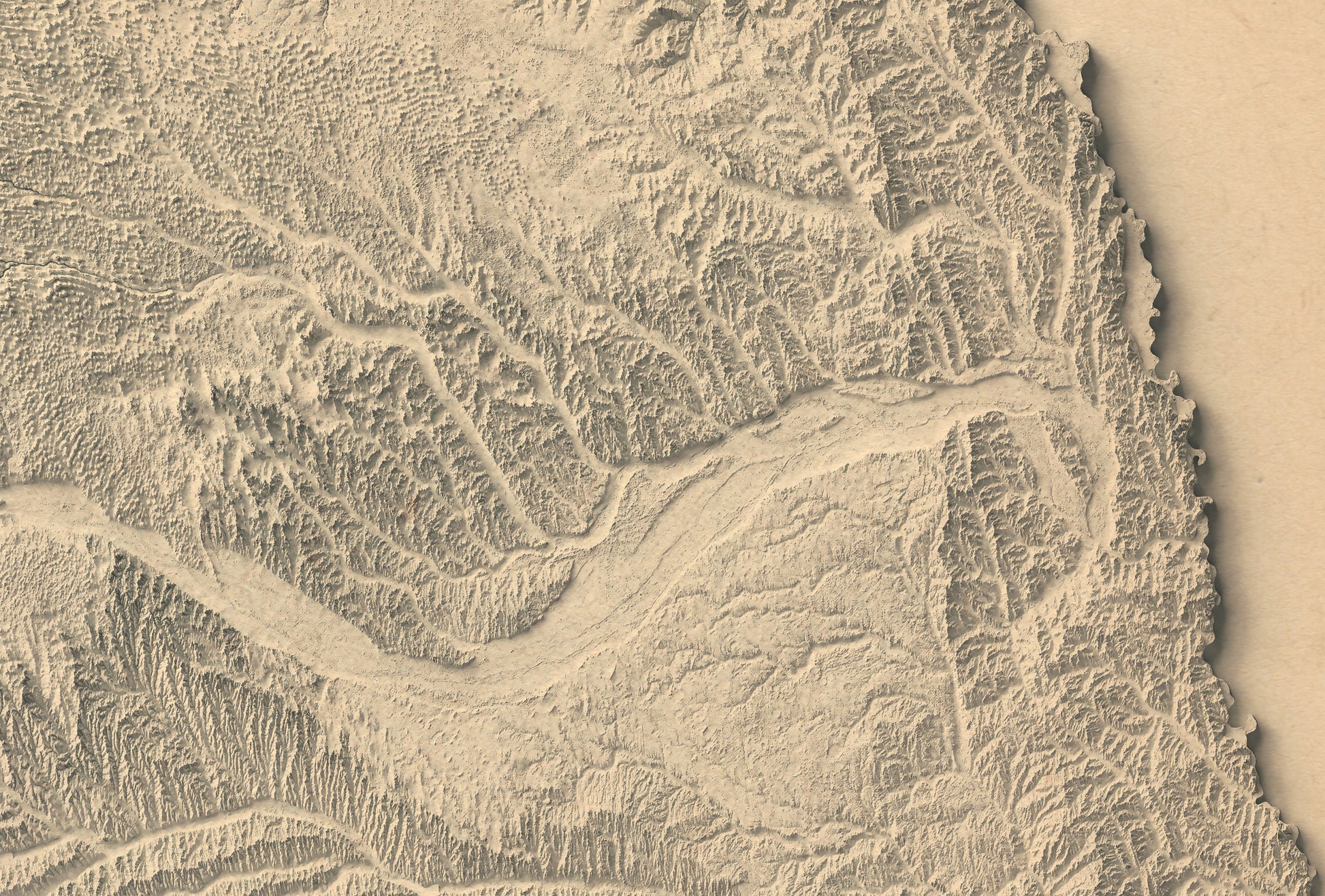 Detailed close-up of a vintage Nebraska (USA) relief map, showcasing textured topography and geographic contours