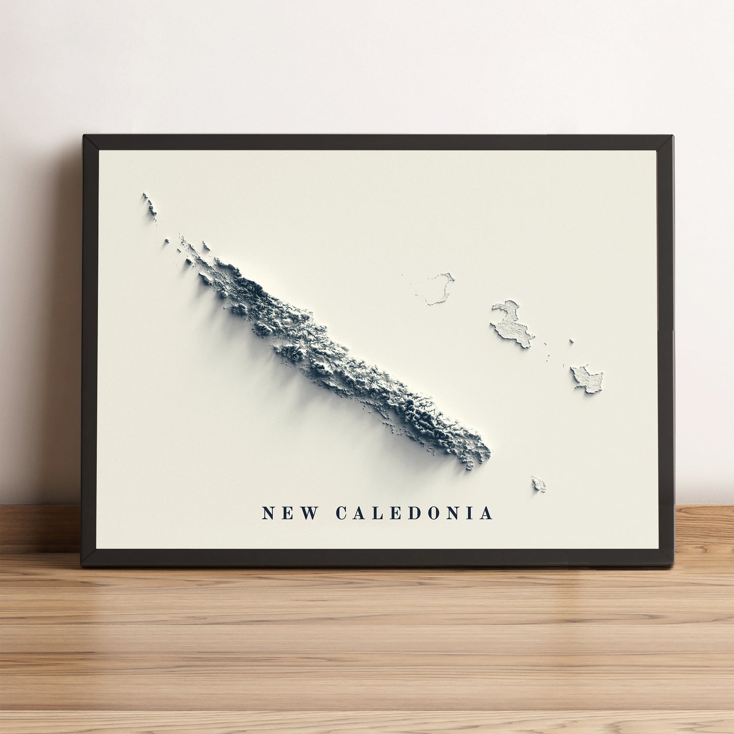 New Caledonia framed shaded relief map in black frame. Artistic print highlighting mountains with a realistic terrain effect