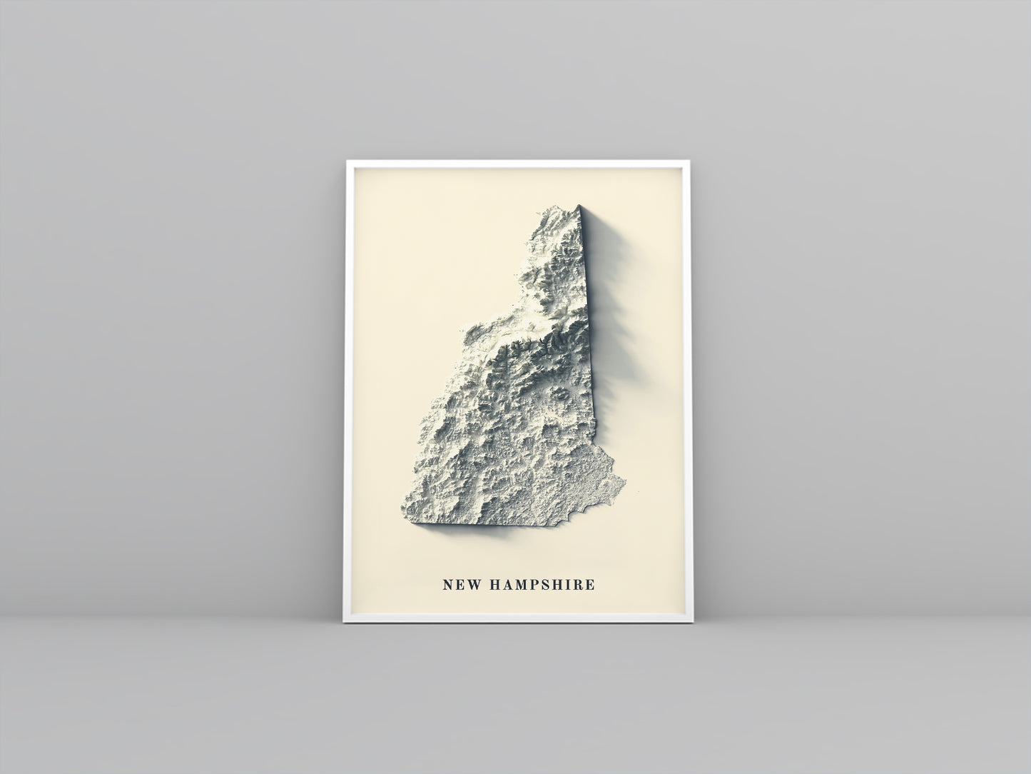 New Hampshire (USA) framed shaded relief map in white frame. Artistic print highlighting mountains with a realistic 3d effect