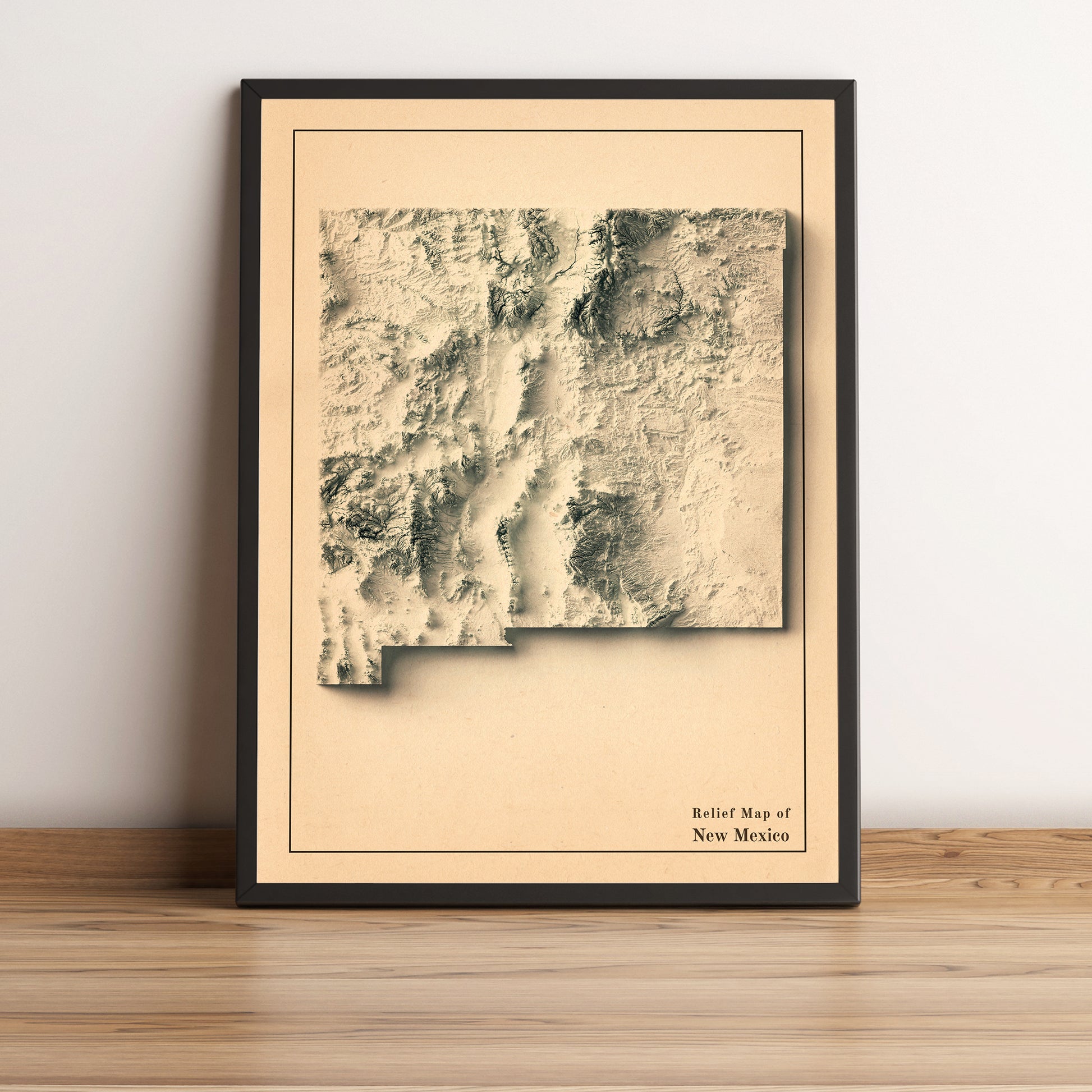 New Mexico (USA) vintage framed shaded relief map in black frame. Artistic print highlighting mountains with a realistic terrain effect