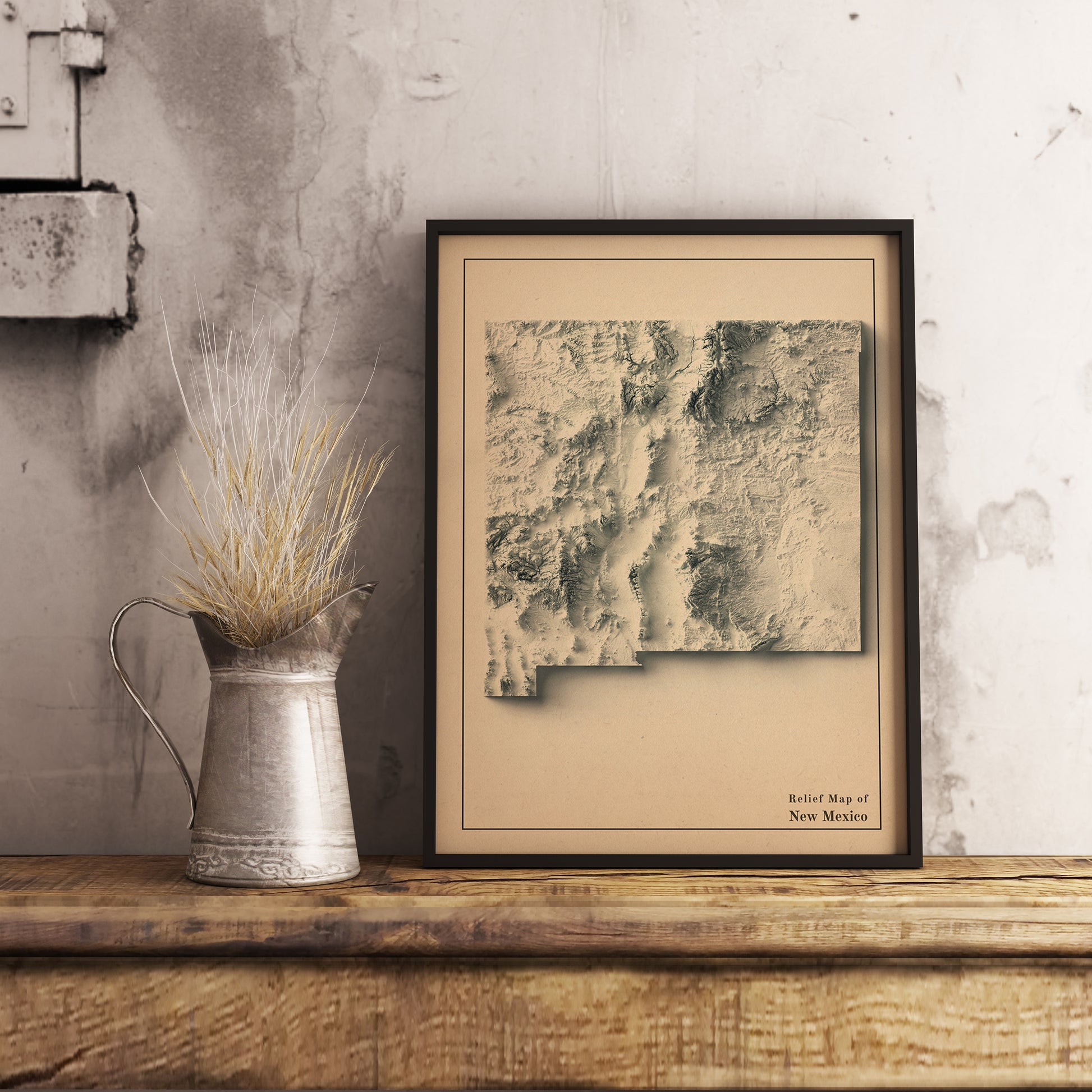 Vintage New Mexico (USA) shaded relief map in black frame. Realistic terrain art print for home decor, displayed on rustic wooden table