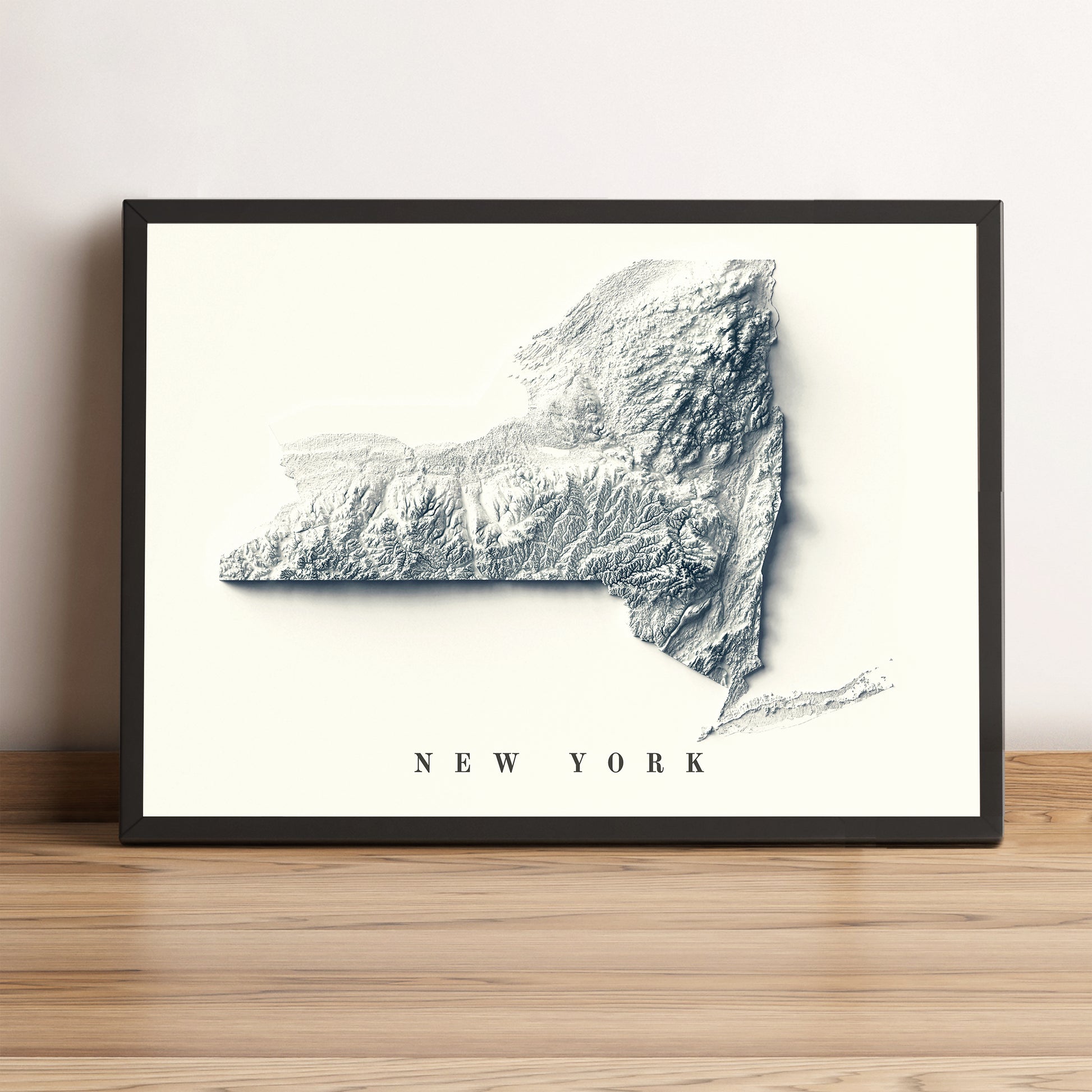 New York State framed shaded relief map in black frame. Artistic print highlighting mountains with a realistic terrain effect