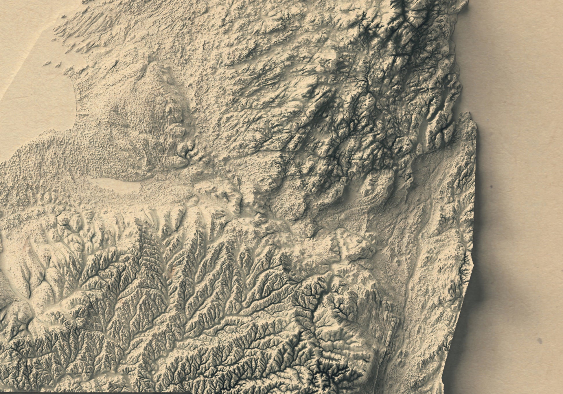 Detailed close-up of a vintage New York State relief map, showcasing textured topography and geographic contours
