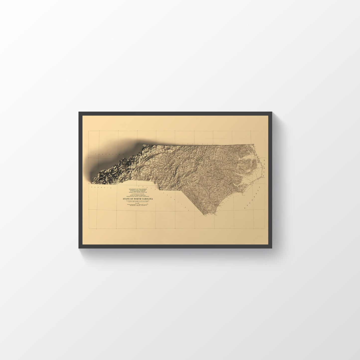 North Carolina (USA) vintage framed shaded relief map in black frame. Artistic print highlighting mountains with a realistic terrain effect