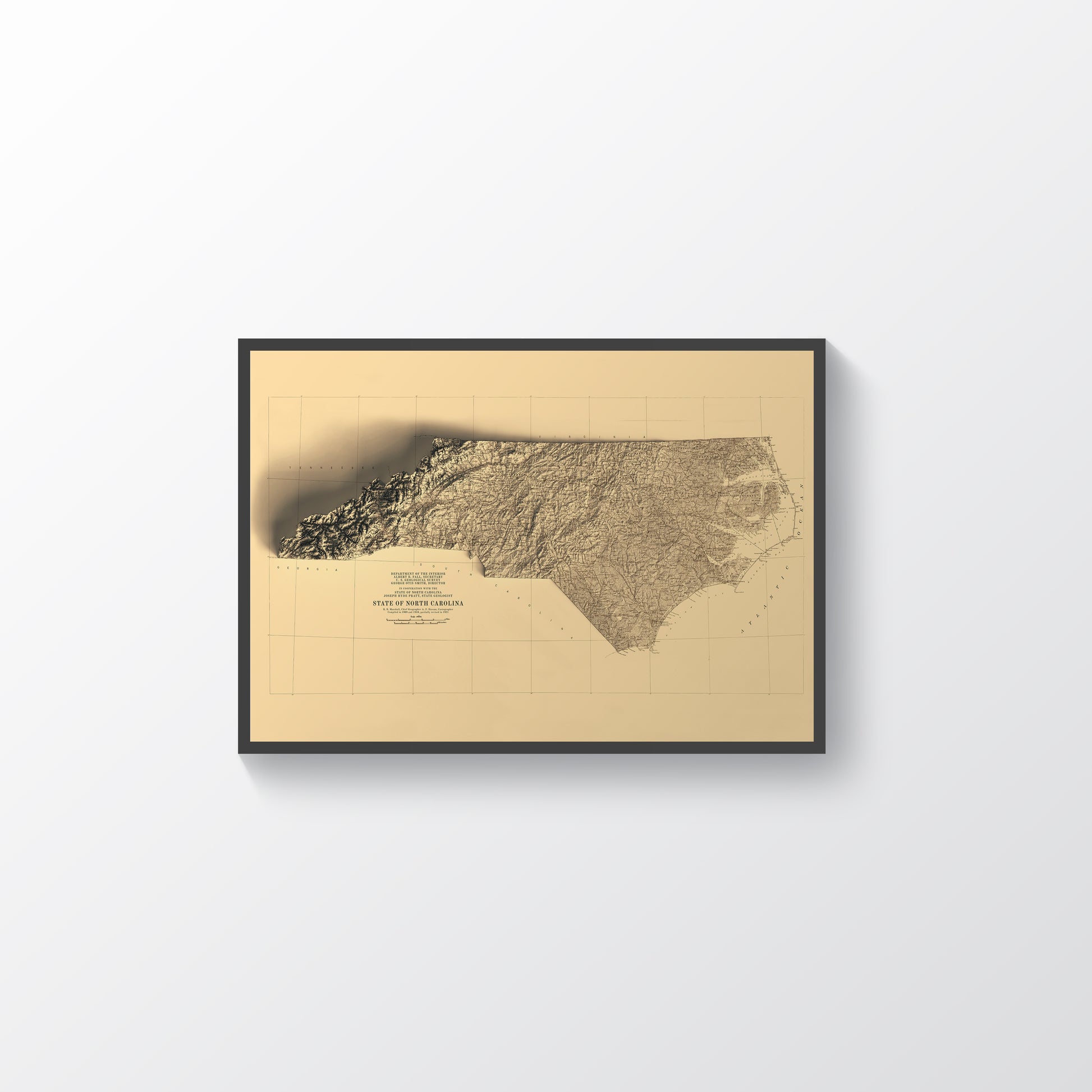 North Carolina (USA) vintage framed shaded relief map in black frame. Artistic print highlighting mountains with a realistic terrain effect