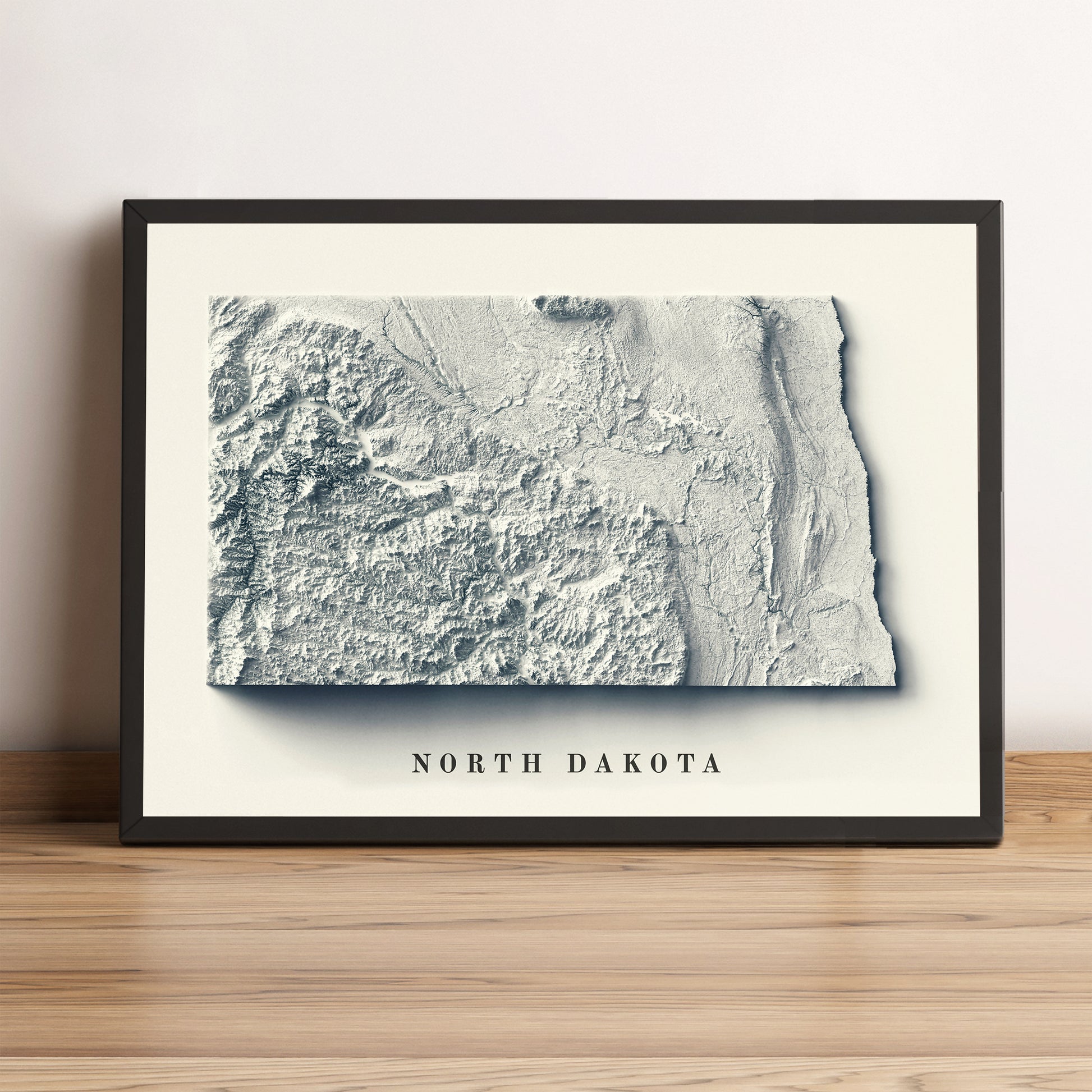 North Dakota (USA) vintage framed shaded relief map in black frame. Artistic print highlighting mountains with a realistic terrain effect