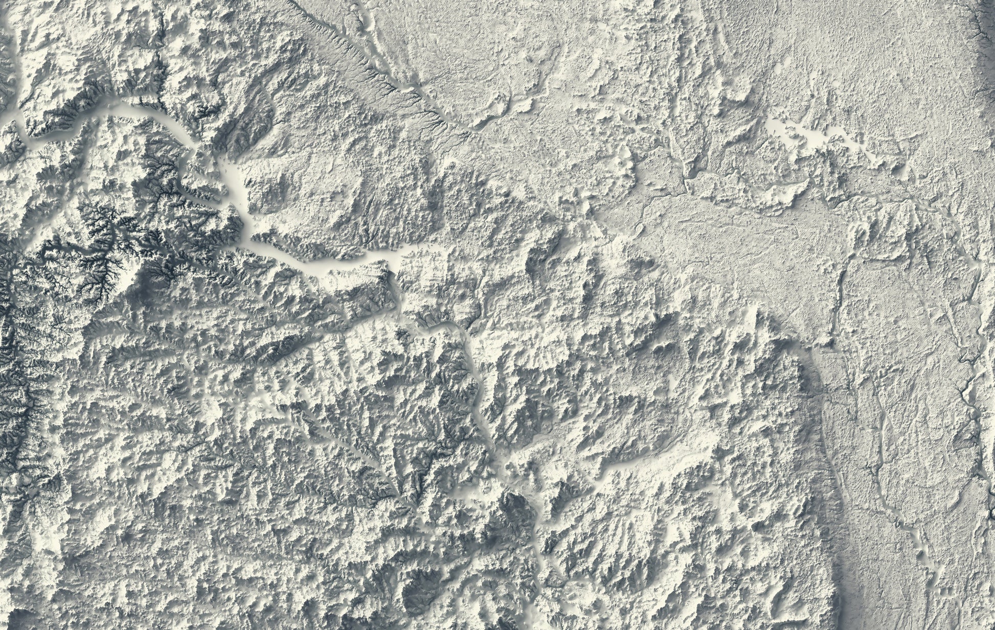 Detailed close-up of a vintage North Dakota (USA) relief map, showcasing textured topography and geographic contours