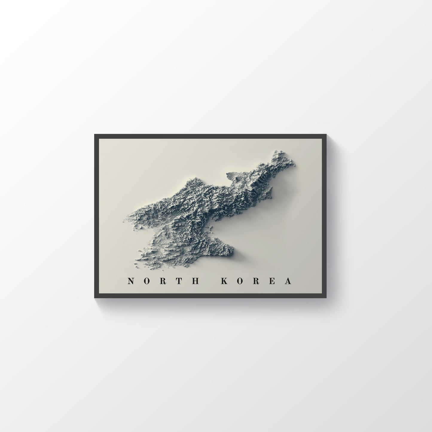 North Korea vintage framed shaded relief map in black frame. Artistic print highlighting mountains with a realistic terrain effect