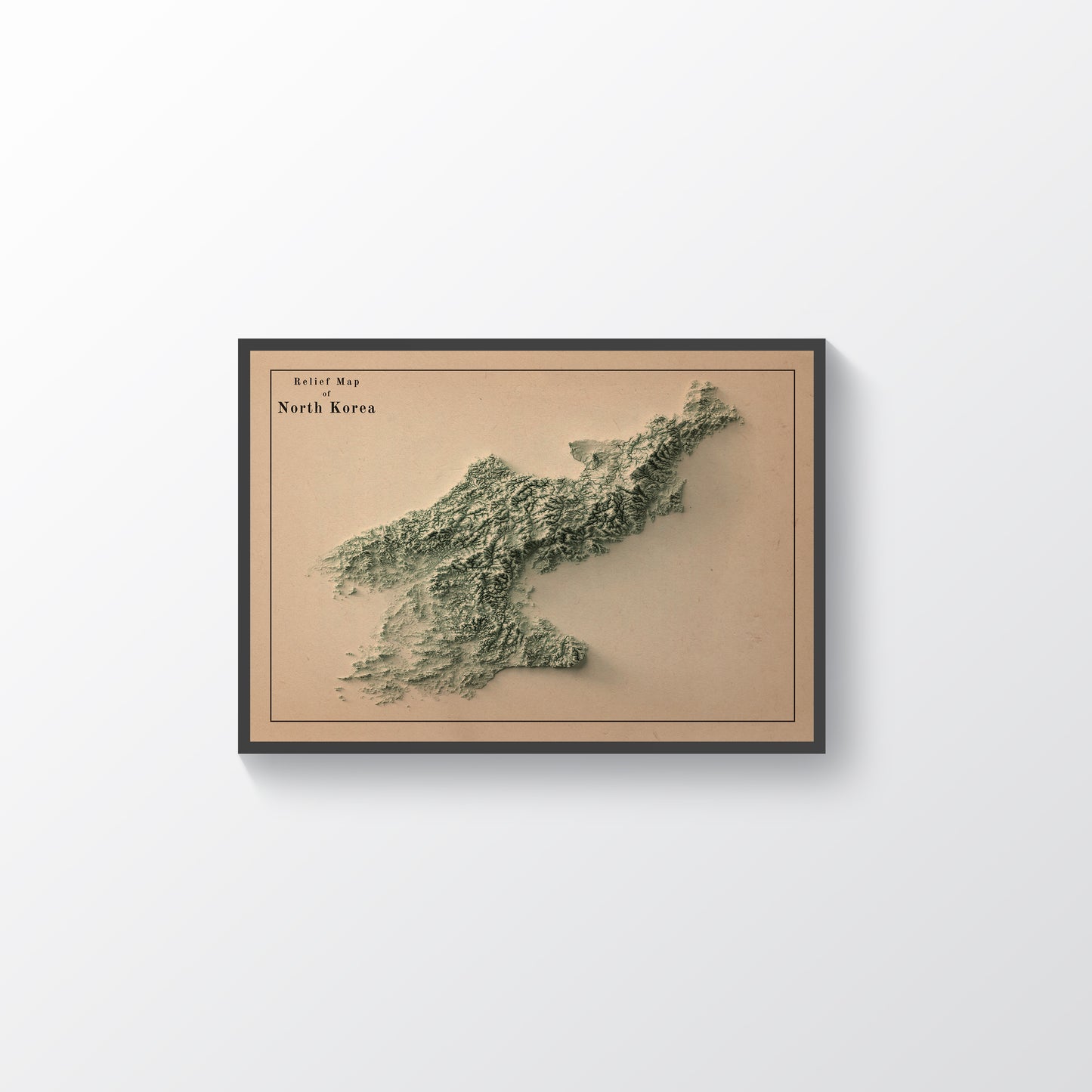 North Korea vintage framed shaded relief map in black frame. Artistic print highlighting mountains with a realistic terrain effect