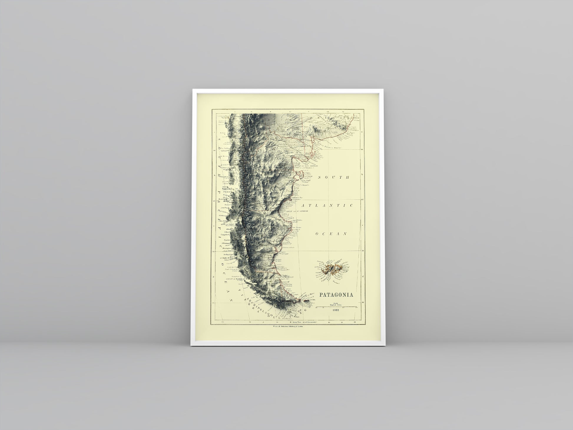 Patagonia vintage framed shaded relief map in white frame. Artistic print highlighting mountains with a realistic 3d effect