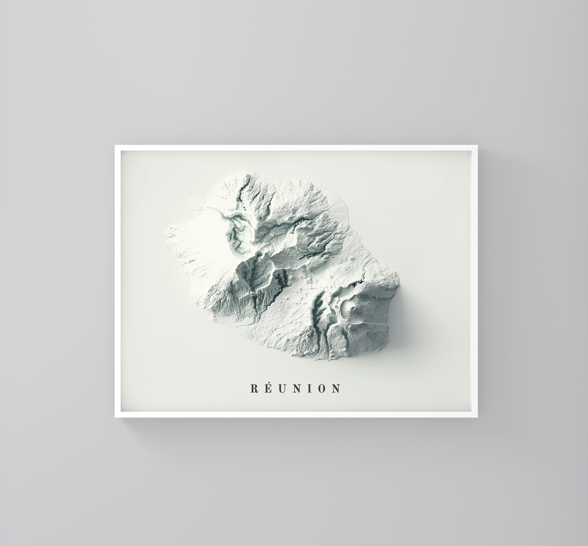Reunion (France) framed shaded relief map in white frame. Artistic print highlighting mountains with a realistic 3d effect