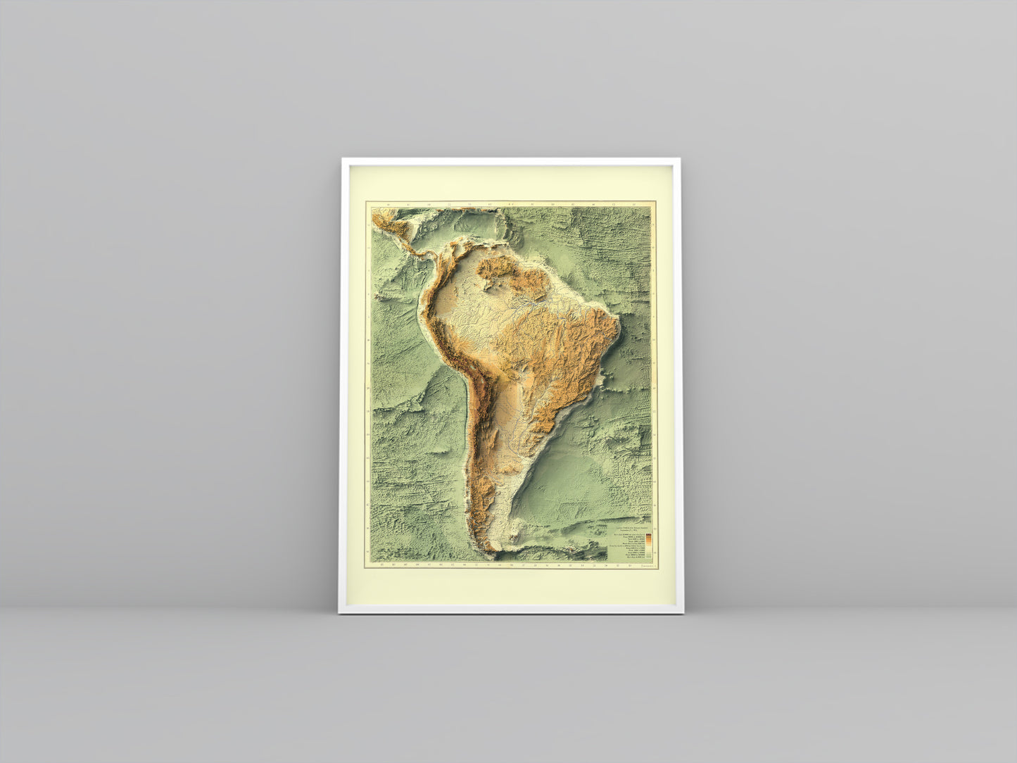 South America Bathymetrical vintage framed shaded relief map in white frame. Artistic print highlighting mountains with a realistic 3d effect