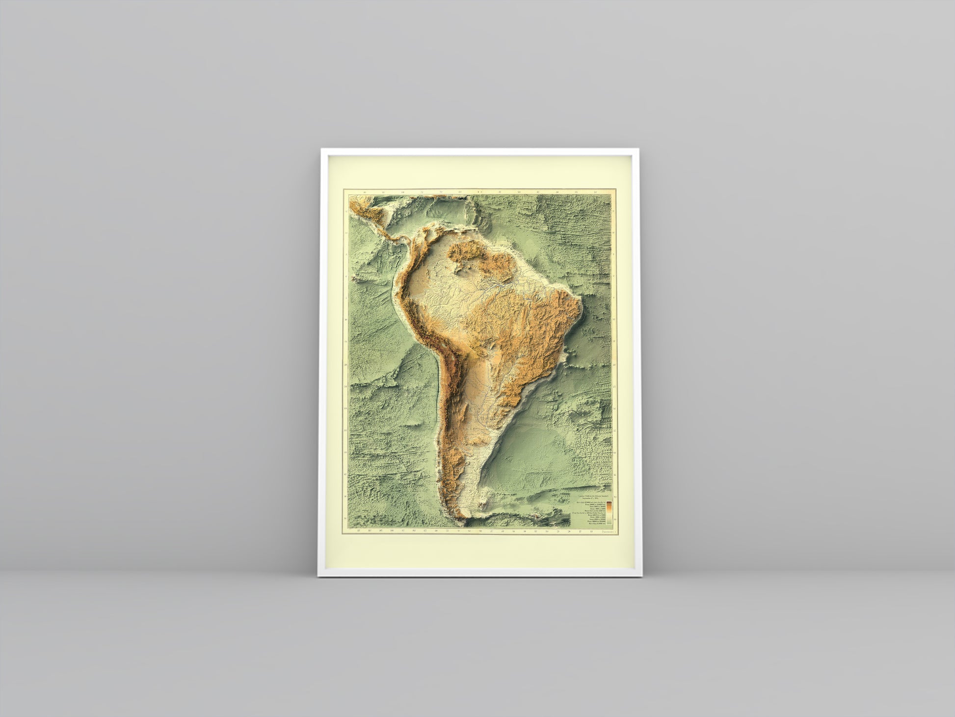 South America Bathymetrical vintage framed shaded relief map in white frame. Artistic print highlighting mountains with a realistic 3d effect