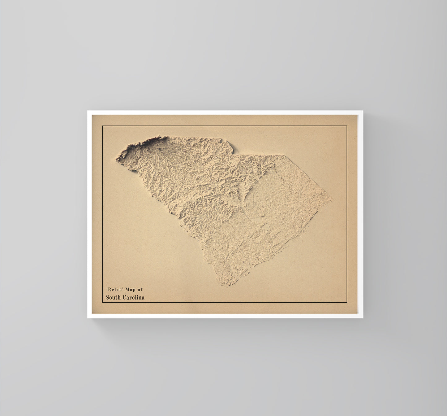 South Carolina (USA) vintage framed shaded relief map in white frame. Artistic print highlighting mountains with a realistic 3d effect