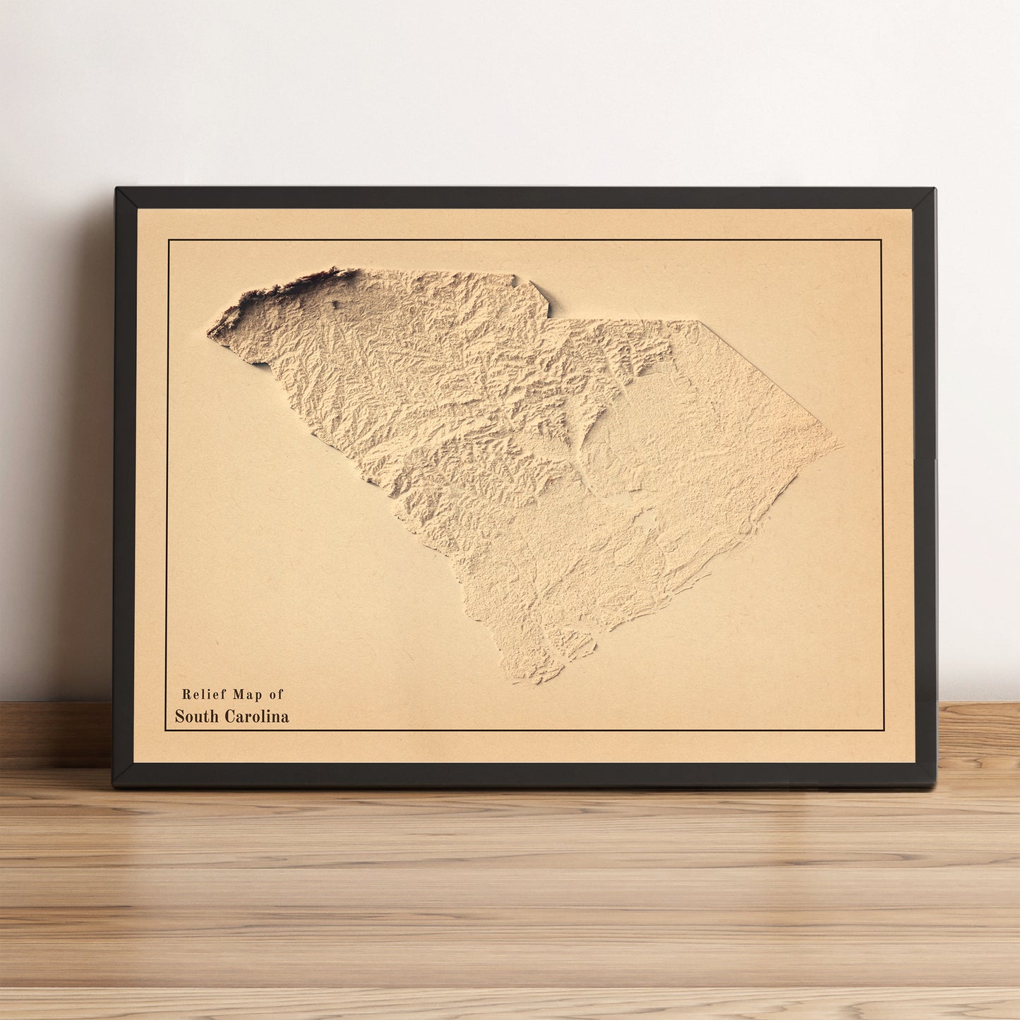 South Carolina (USA) vintage framed shaded relief map in black frame. Artistic print highlighting mountains with a realistic terrain effect