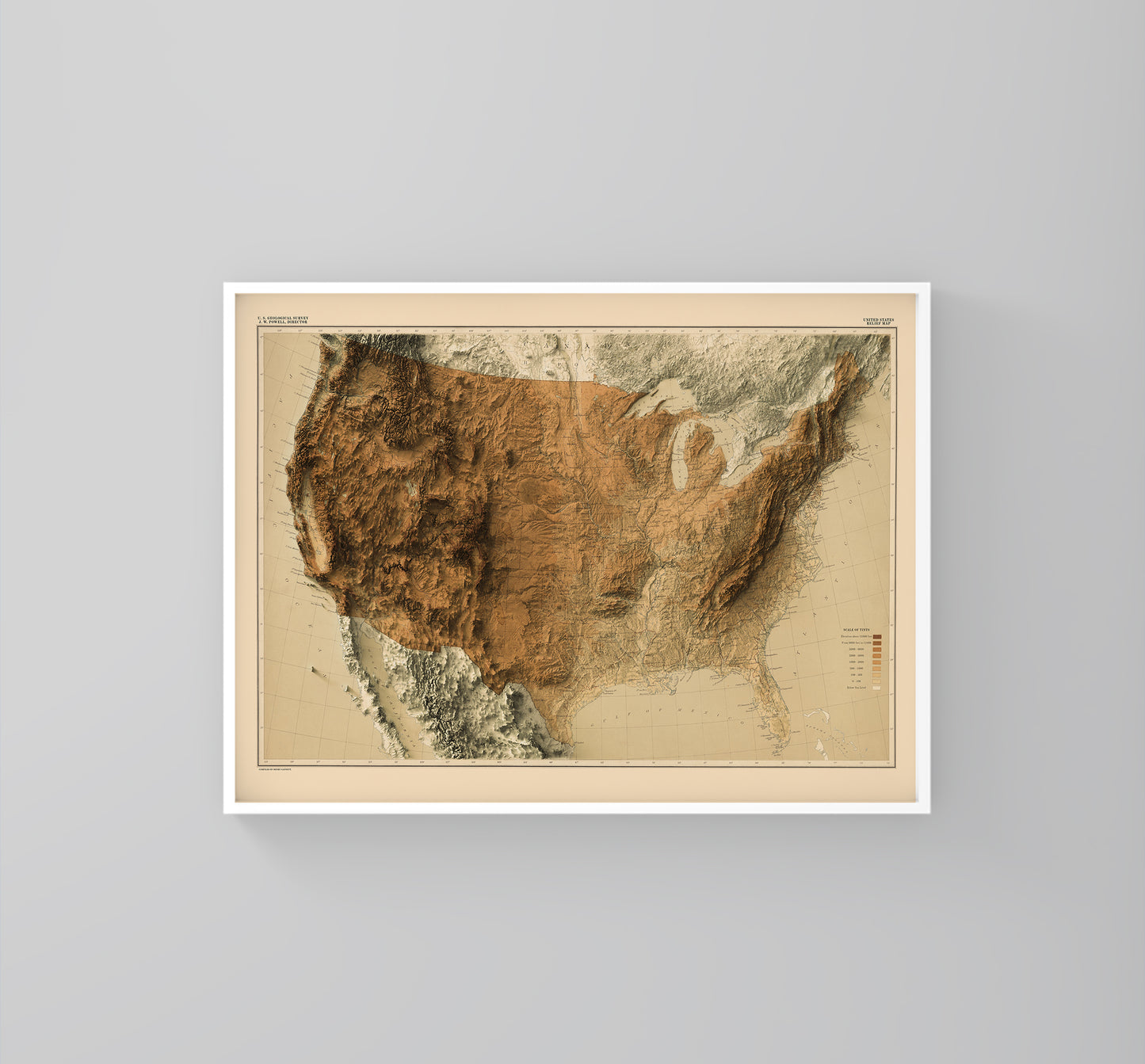 United States (USA) vintage framed shaded relief map in white frame. Artistic print highlighting mountains with a realistic 3d effect