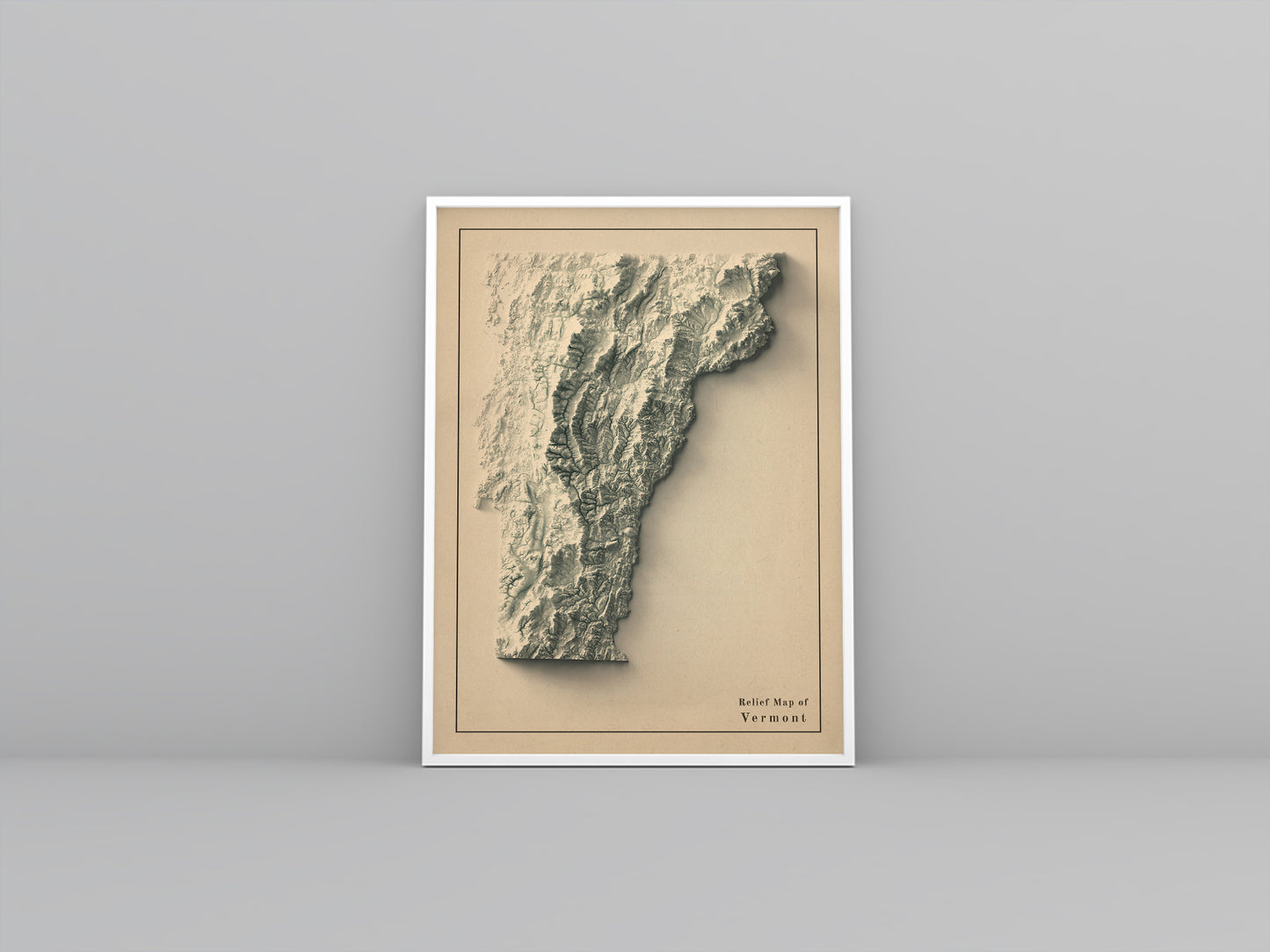 Vermont (USA) vintage framed shaded relief map in white frame. Artistic print highlighting mountains with a realistic 3d effect
