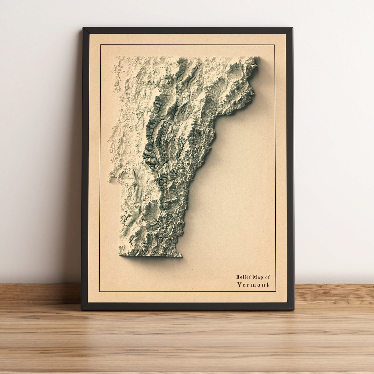 Vermont (USA) vintage framed shaded relief map in black frame. Artistic print highlighting mountains with a realistic terrain effect