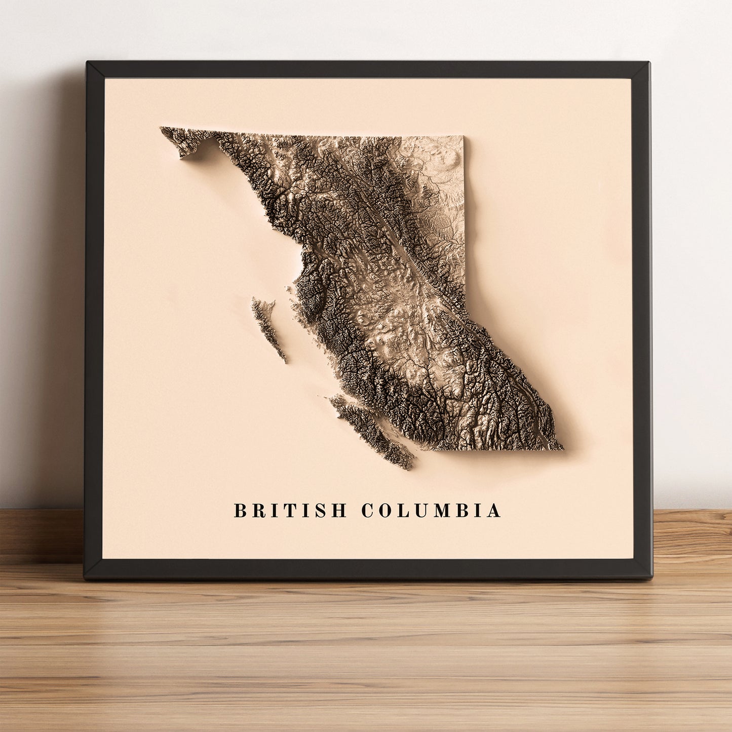 British Columbia (Canada) vintage framed shaded relief map in black frame. Artistic print highlighting mountains with a realistic terrain effect