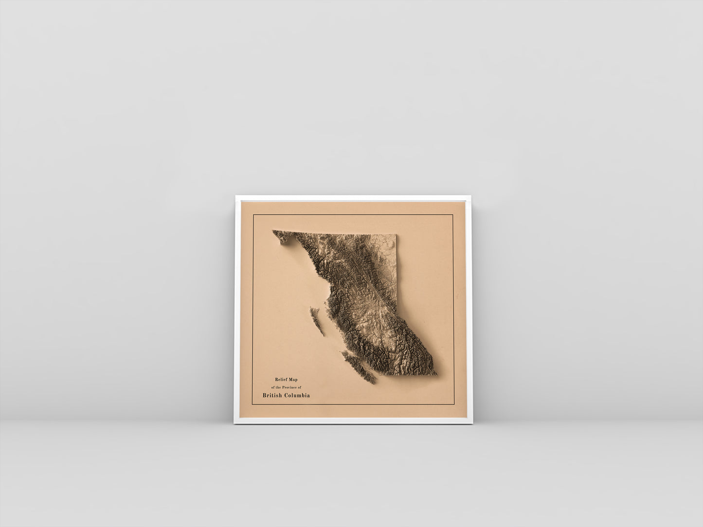 British Columbia (Canada) vintage framed shaded relief map in white frame. Artistic print highlighting mountains with a realistic 3d effect