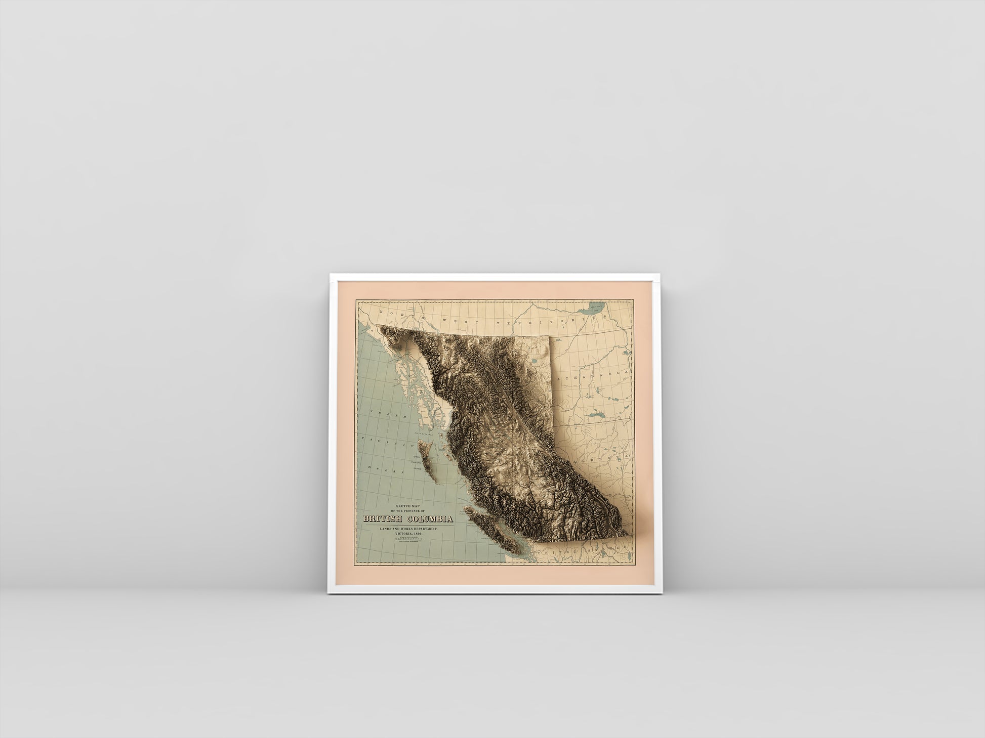 British Columbia (Canada) vintage framed shaded relief map in white frame. Artistic print highlighting mountains with a realistic 3d effect