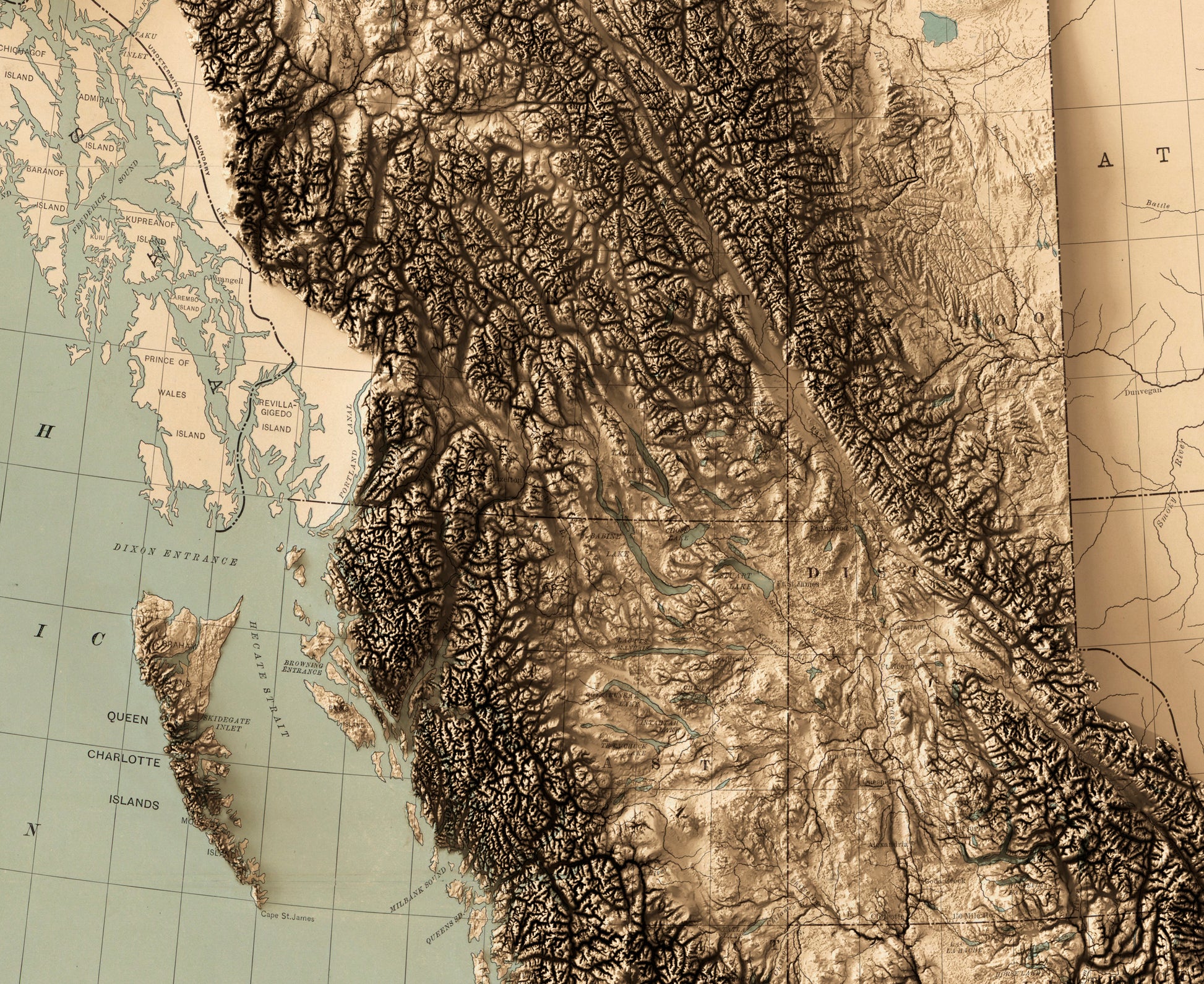 Detailed close-up of a British Columbia (Canada) relief map, showcasing textured topography and geographic contours