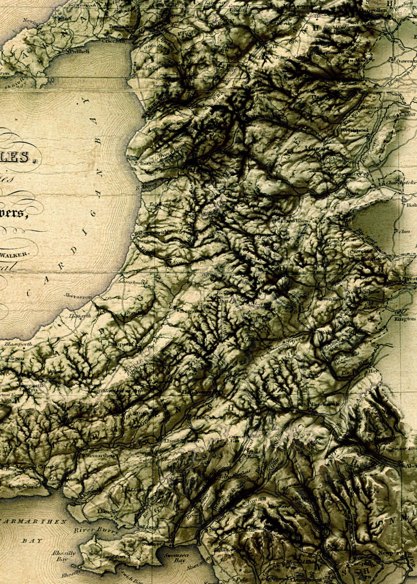 Detailed close-up of a vintage Wales relief map, showcasing textured topography and geographic contours