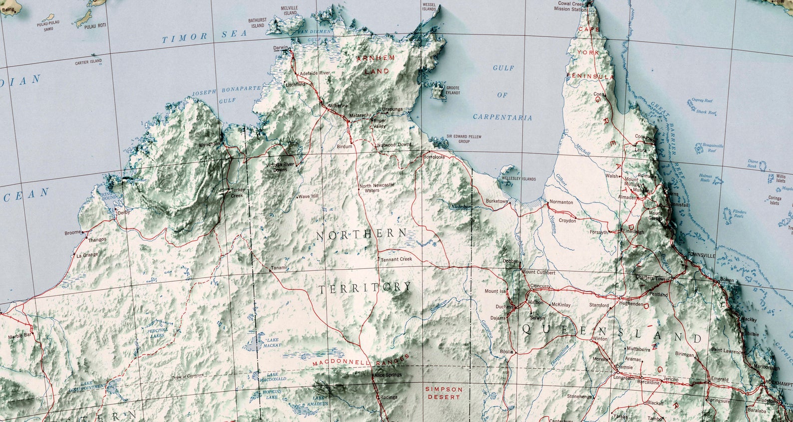 Detailed close-up of a vintage Australia relief map, showcasing textured topography and geographic contours