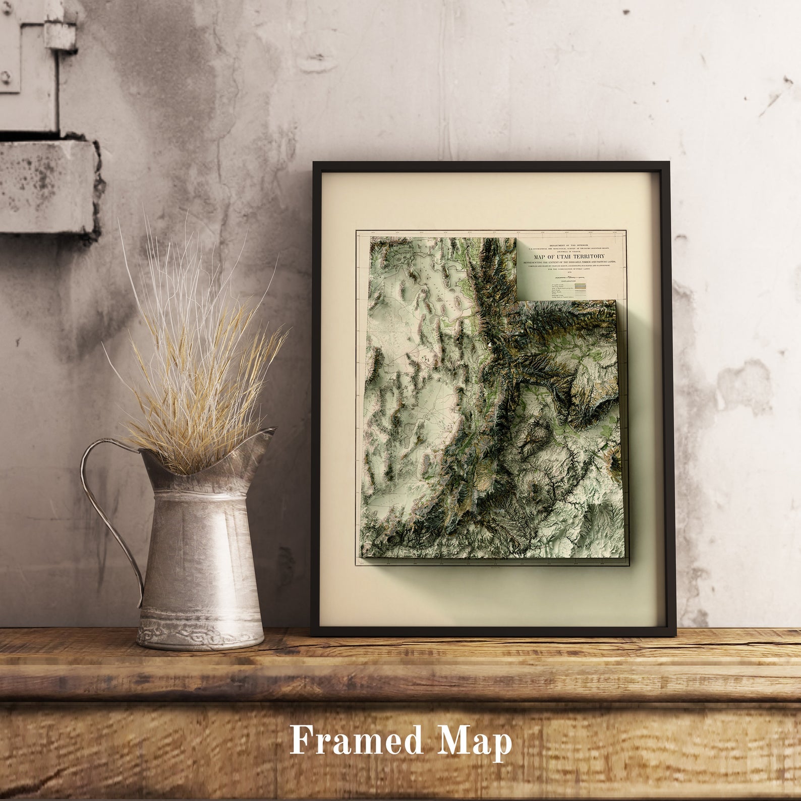 Vintage Utah (USA) shaded relief map in black frame. Realistic terrain art print for home decor, displayed on rustic wooden table