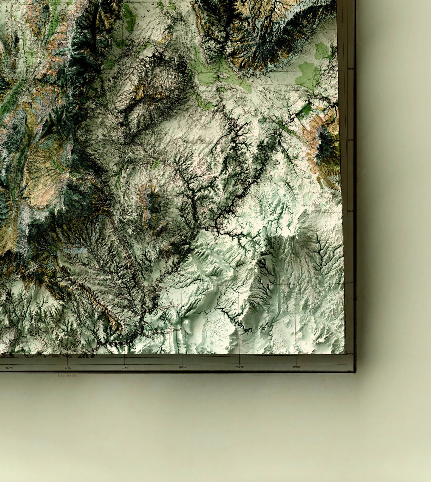 Detailed close-up of a vintage Utah (USA) relief map, showcasing textured topography and geographic contours
