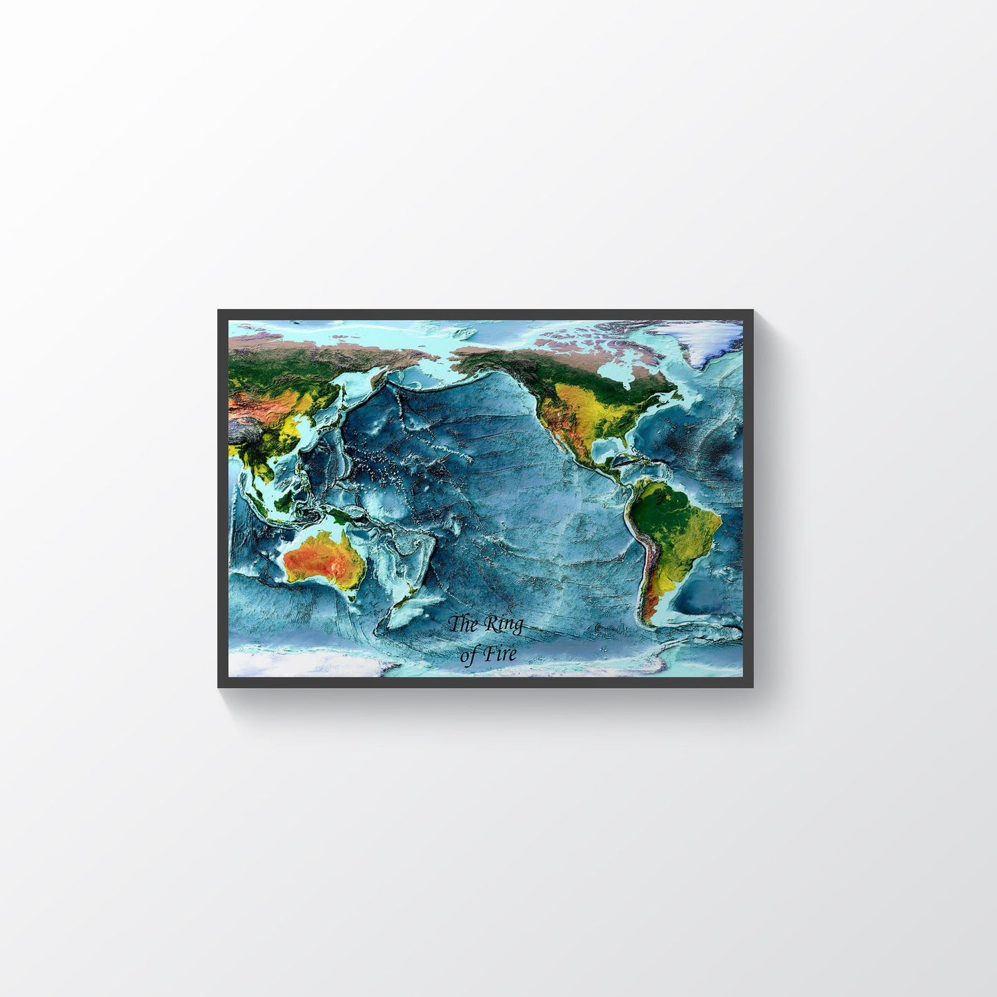 Pacific Ocean, Ring of Fire framed shaded relief map in black frame. Artistic print highlighting mountains with a realistic terrain effect
