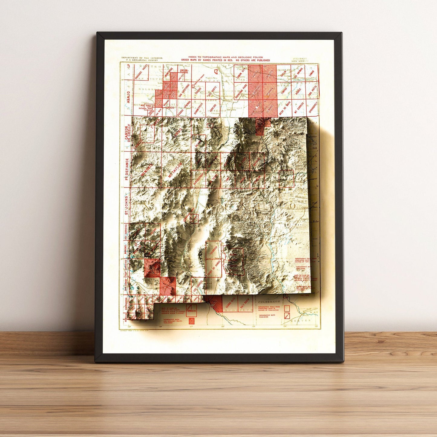 New Mexico (USA) vintage framed shaded relief map in black frame. Artistic print highlighting mountains with a realistic terrain effect