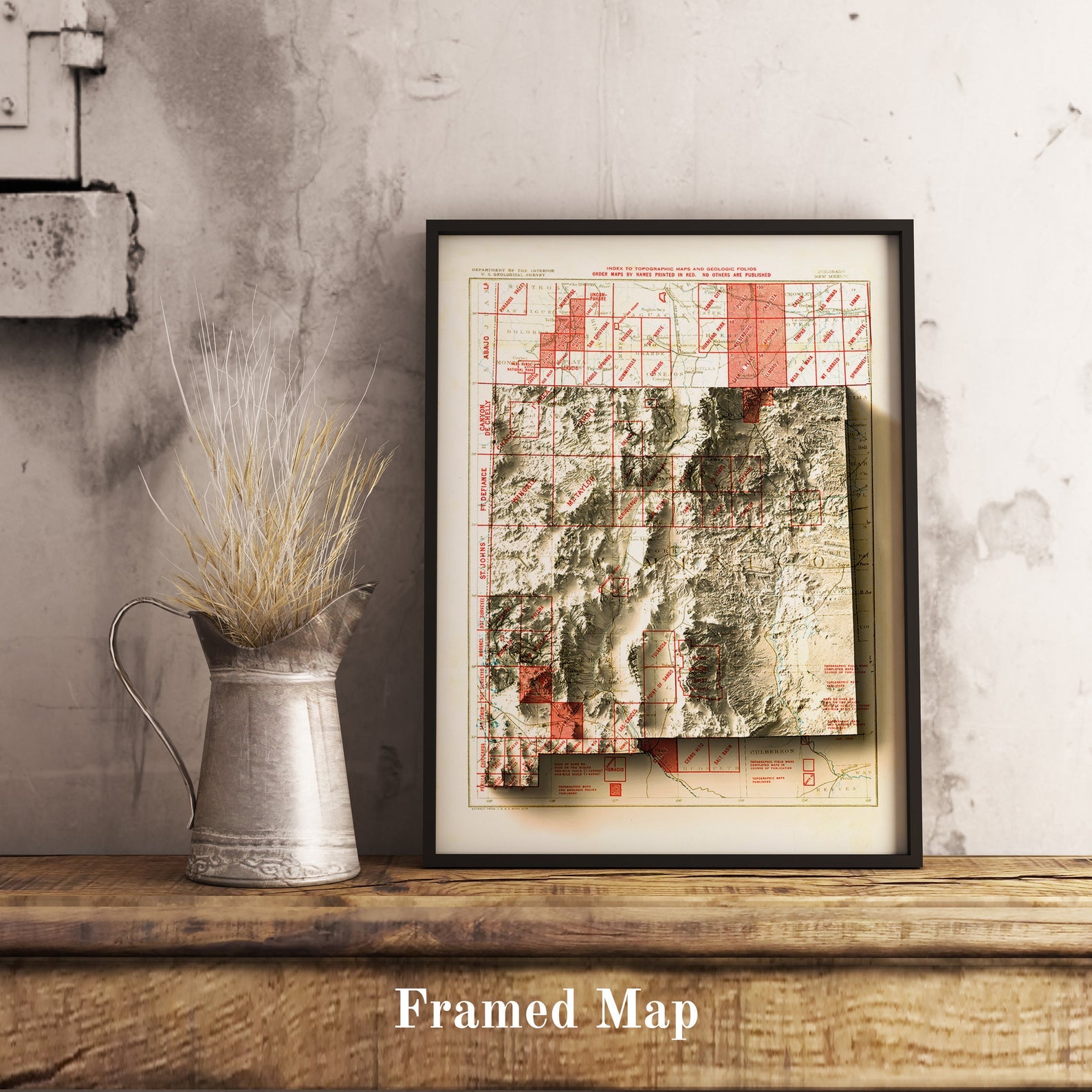 Vintage New Mexico (USA) shaded relief map in black frame. Realistic terrain art print for home decor, displayed on rustic wooden table