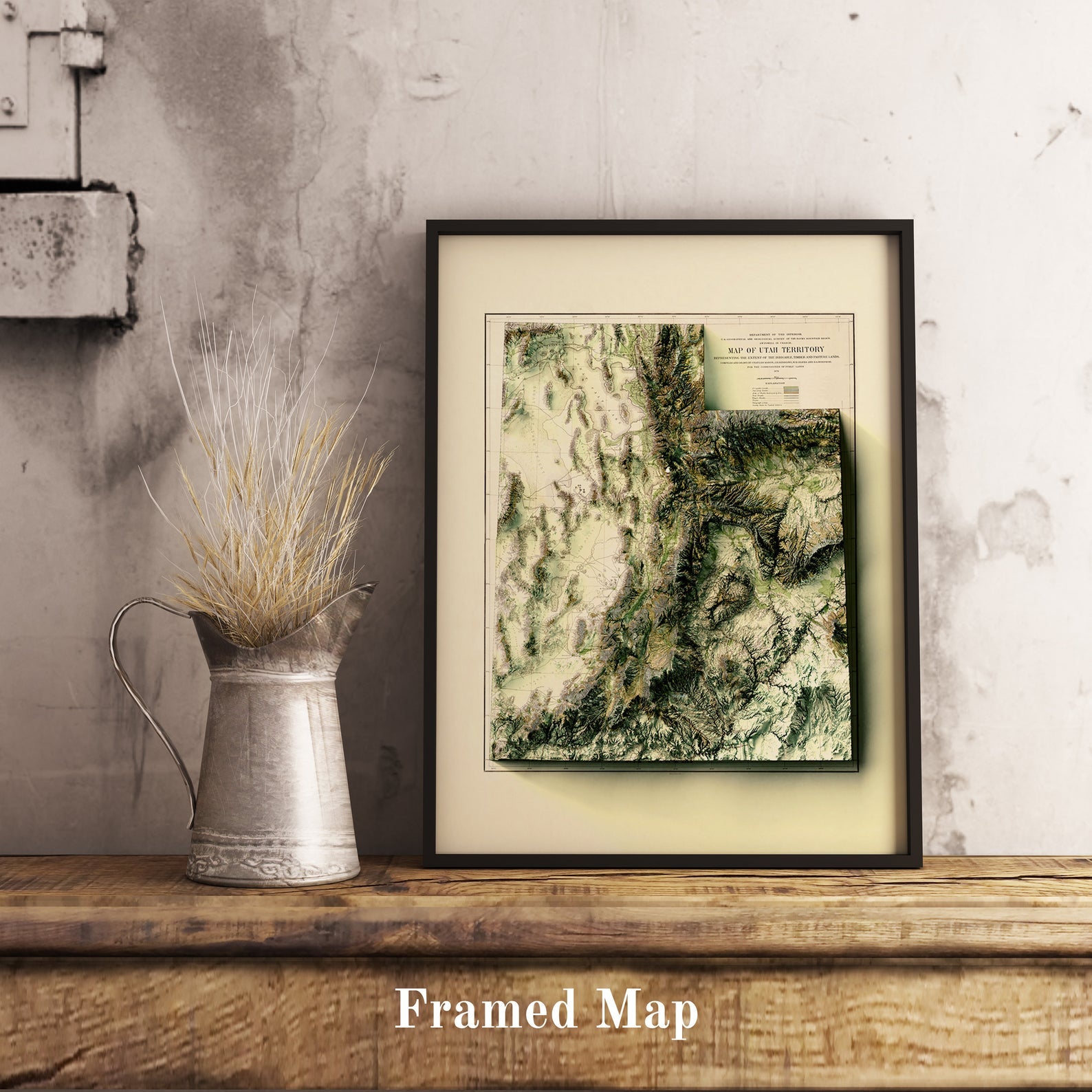 Vintage Utah (USA) shaded relief map in black frame. Realistic terrain art print for home decor, displayed on rustic wooden table
