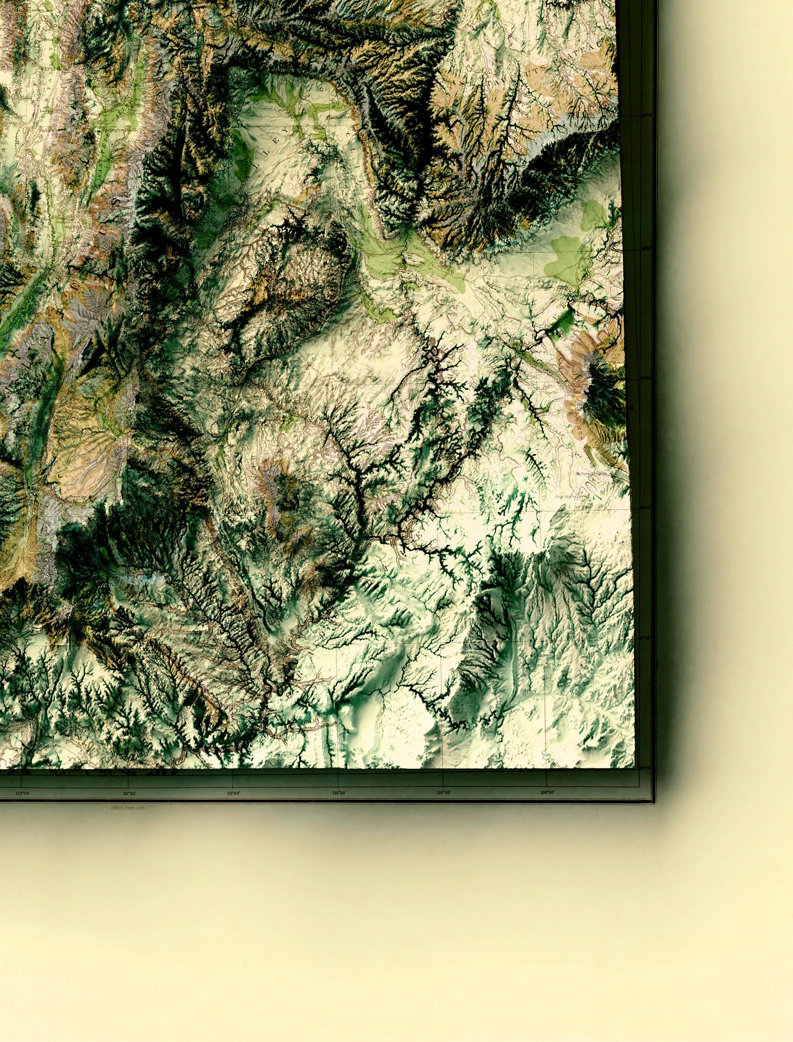 Detailed close-up of a vintage Utah (USA) relief map, showcasing textured topography and geographic contours