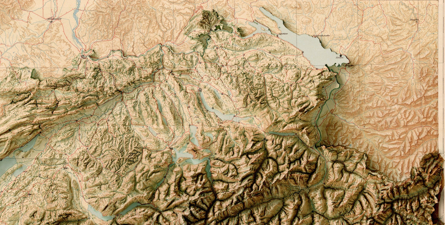 Detailed close-up of a vintage Sweitzerland relief map, showcasing textured topography and geographic contours
