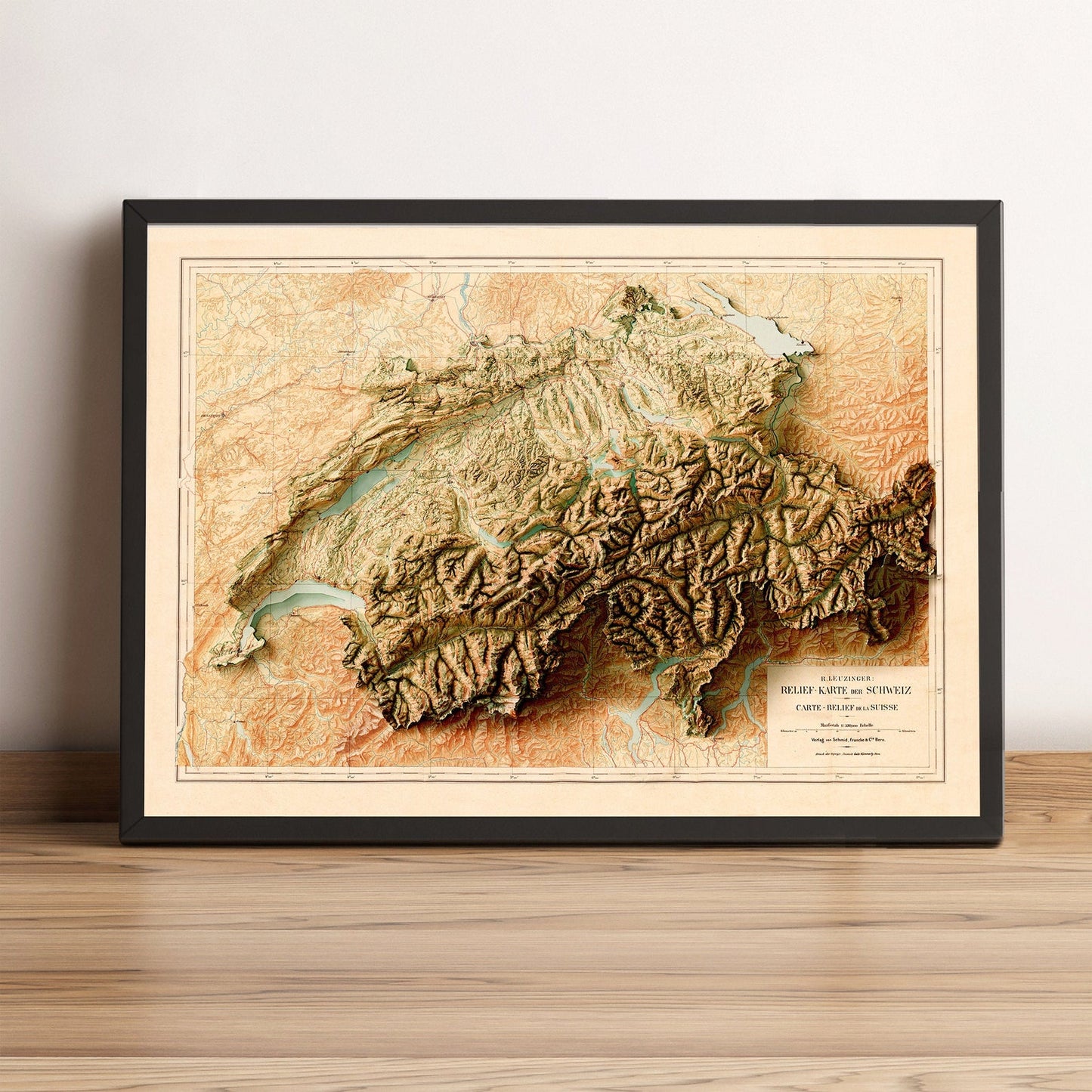 Switzerland vintage framed shaded relief map in black frame. Artistic print highlighting mountains with a realistic terrain effect