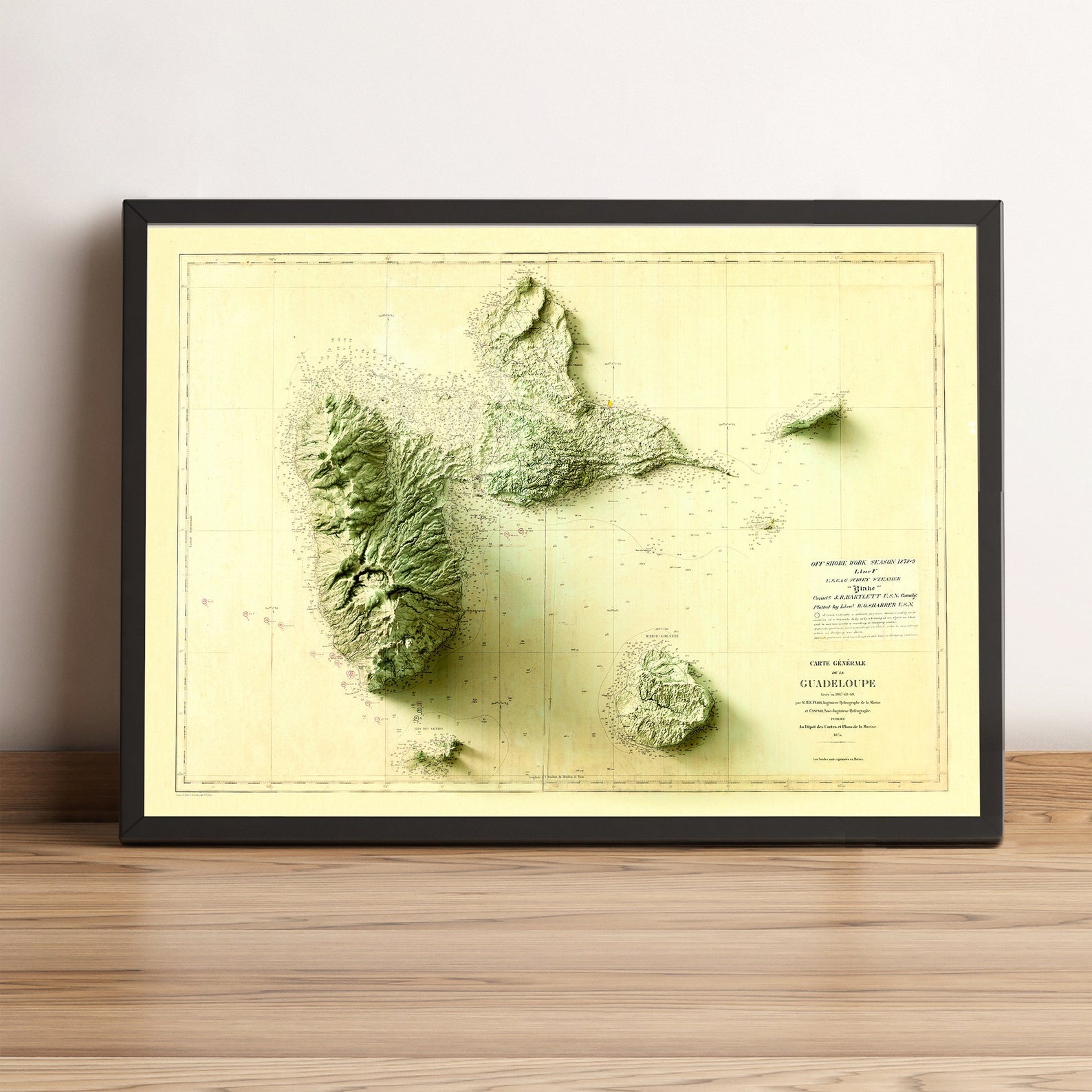 Guadeloupe (France) vintage framed shaded relief map in black frame. Artistic print highlighting mountains with a realistic terrain effect