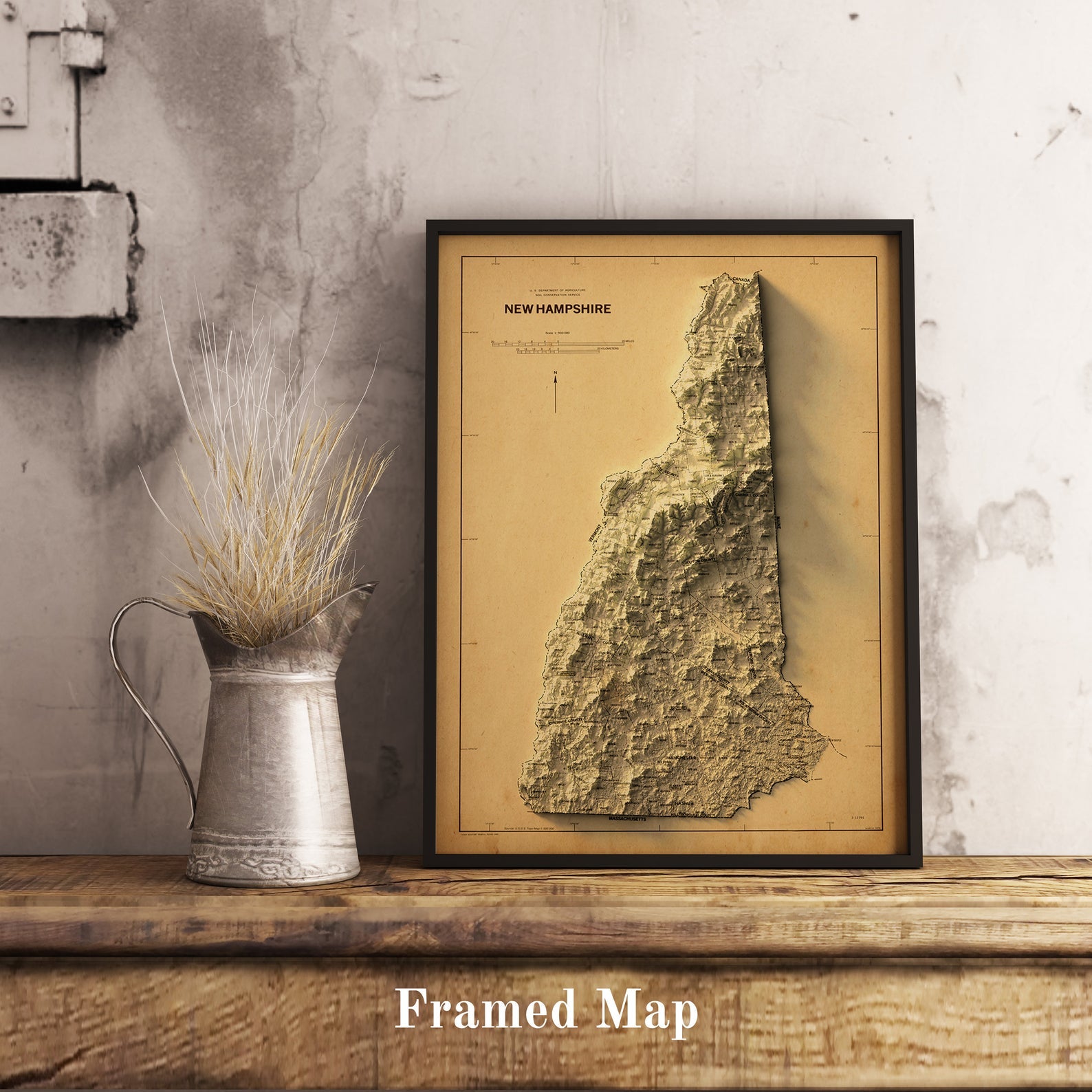 Vintage New Hampshire (USA) shaded relief map in black frame. Realistic terrain art print for home decor, displayed on rustic wooden table