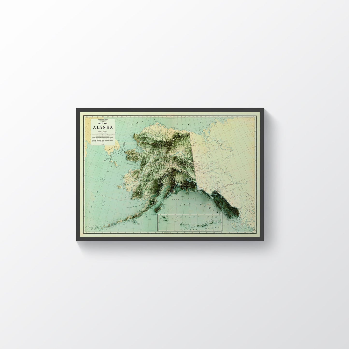 Alaska (USA) vintage framed shaded relief map in black frame. Artistic print highlighting mountains with a realistic terrain effect
