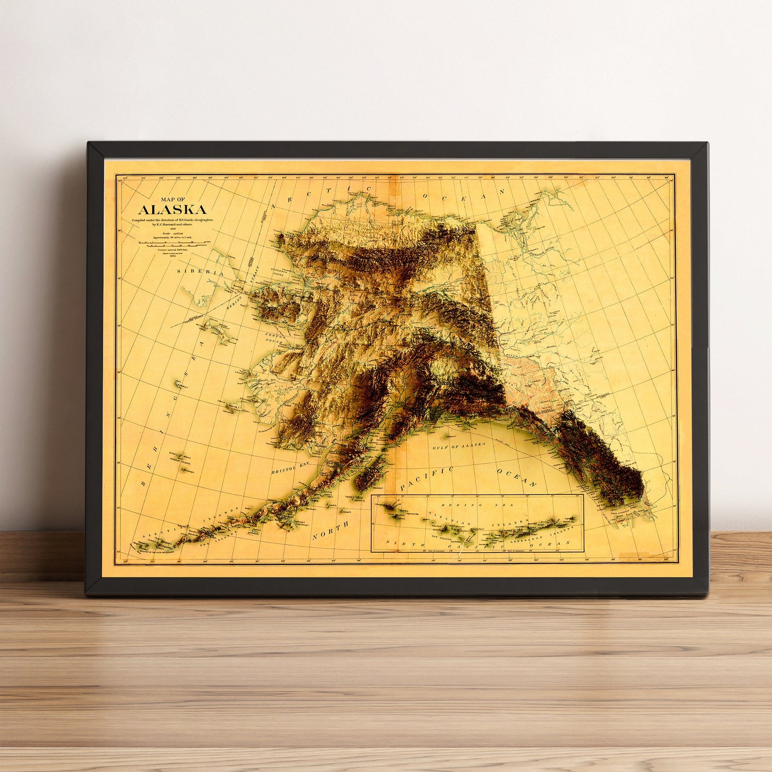 Alaska (USA) vintage framed shaded relief map in black frame. Artistic print highlighting mountains with a realistic terrain effect