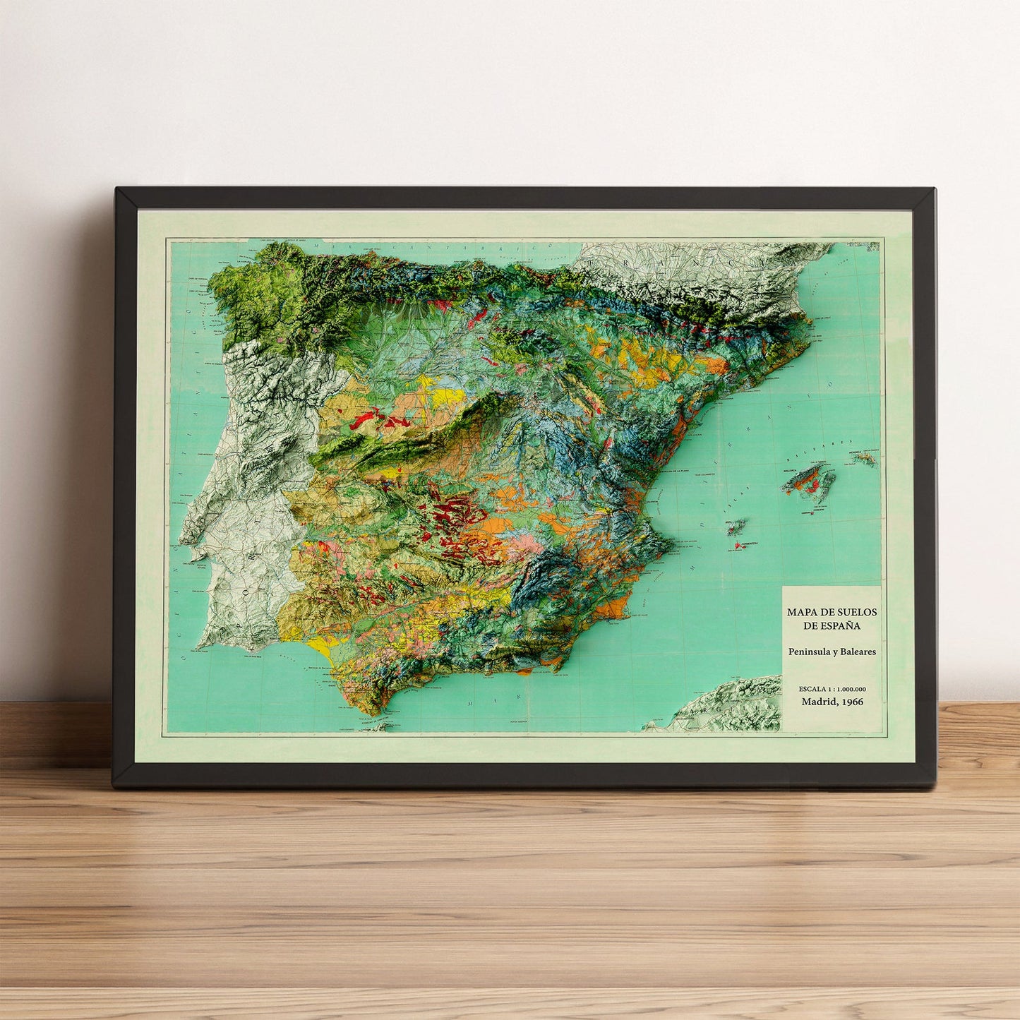 Spain vintage framed shaded relief map in black frame. Artistic print highlighting mountains with a realistic terrain effect