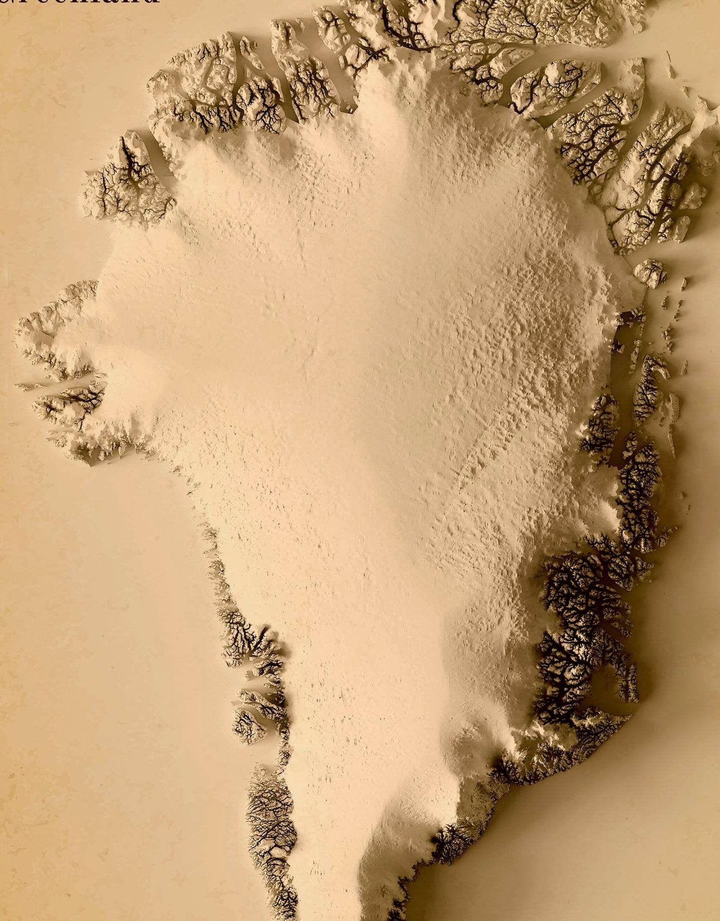 Detailed close-up of a vintage Greenland relief map, showcasing textured topography and geographic contours