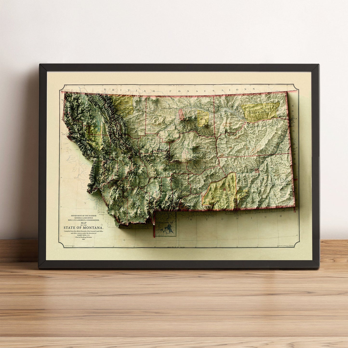 Montana (USA) vintage framed shaded relief map in black frame. Artistic print highlighting mountains with a realistic terrain effect