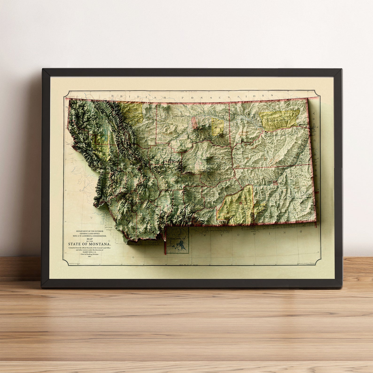 Montana (USA) vintage framed shaded relief map in black frame. Artistic print highlighting mountains with a realistic terrain effect