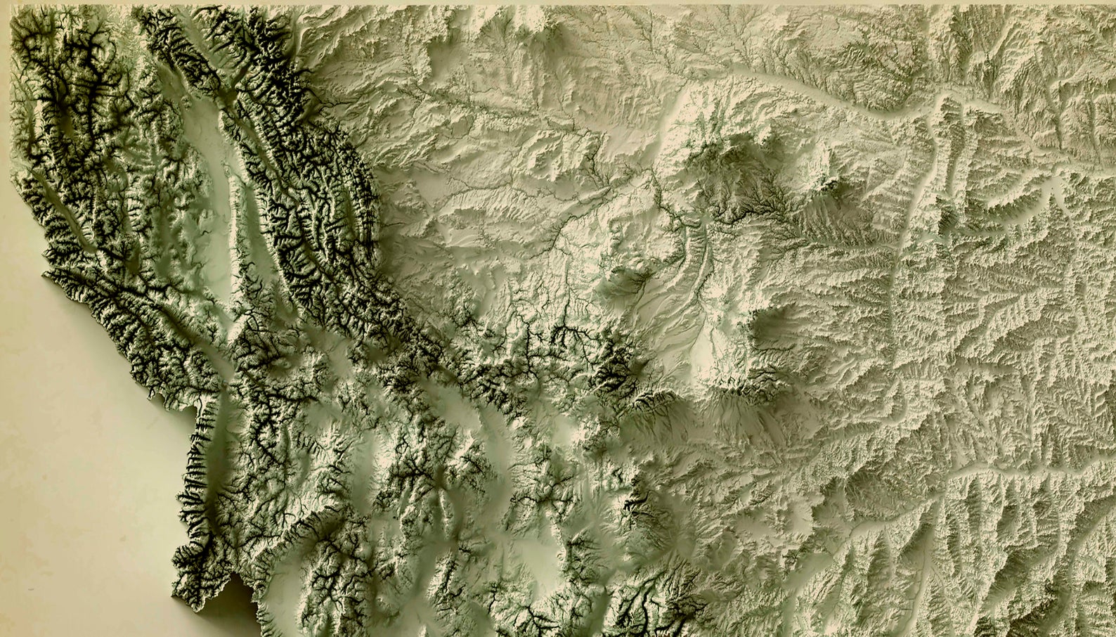 Detailed close-up of a vintage Montana (USA) relief map, showcasing textured topography and geographic contours