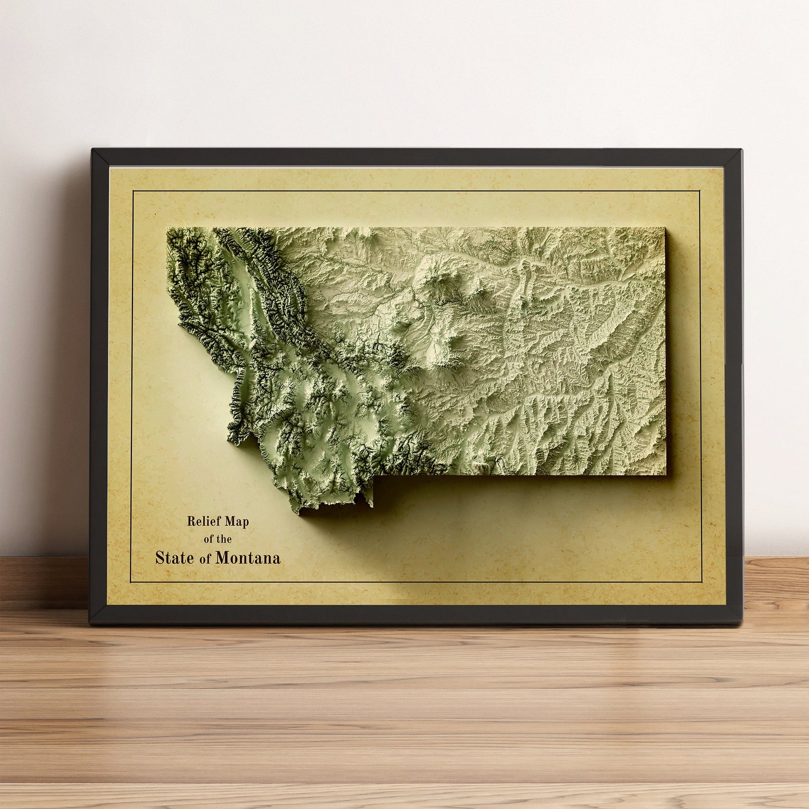 Montana (USA) vintage framed shaded relief map in black frame. Artistic print highlighting mountains with a realistic terrain effect